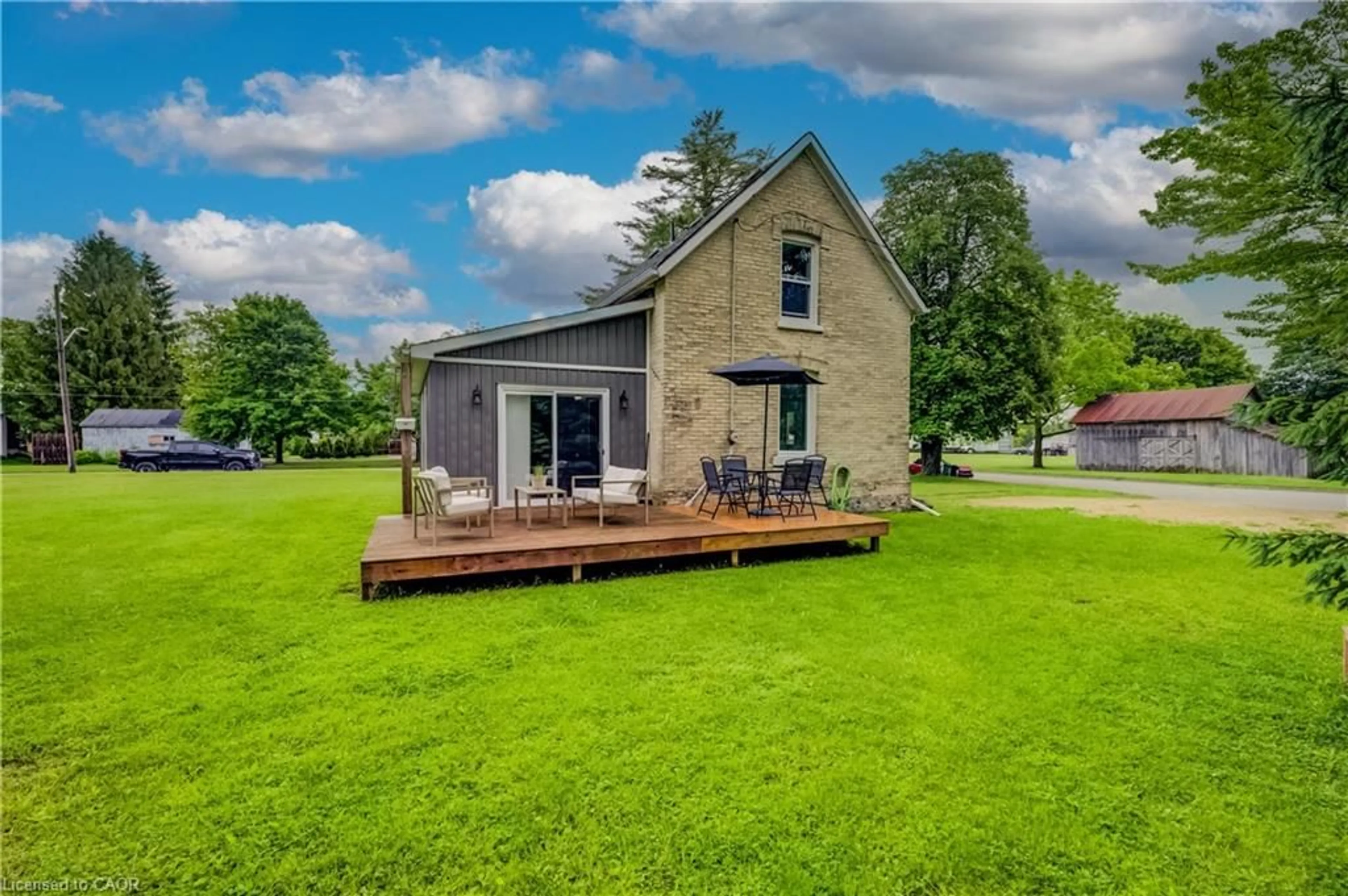 A pic from outside/outdoor area/front of a property/back of a property/a pic from drone, water/lake/river/ocean view for 455 Durham St, Mount Forest Ontario N0G 2L0