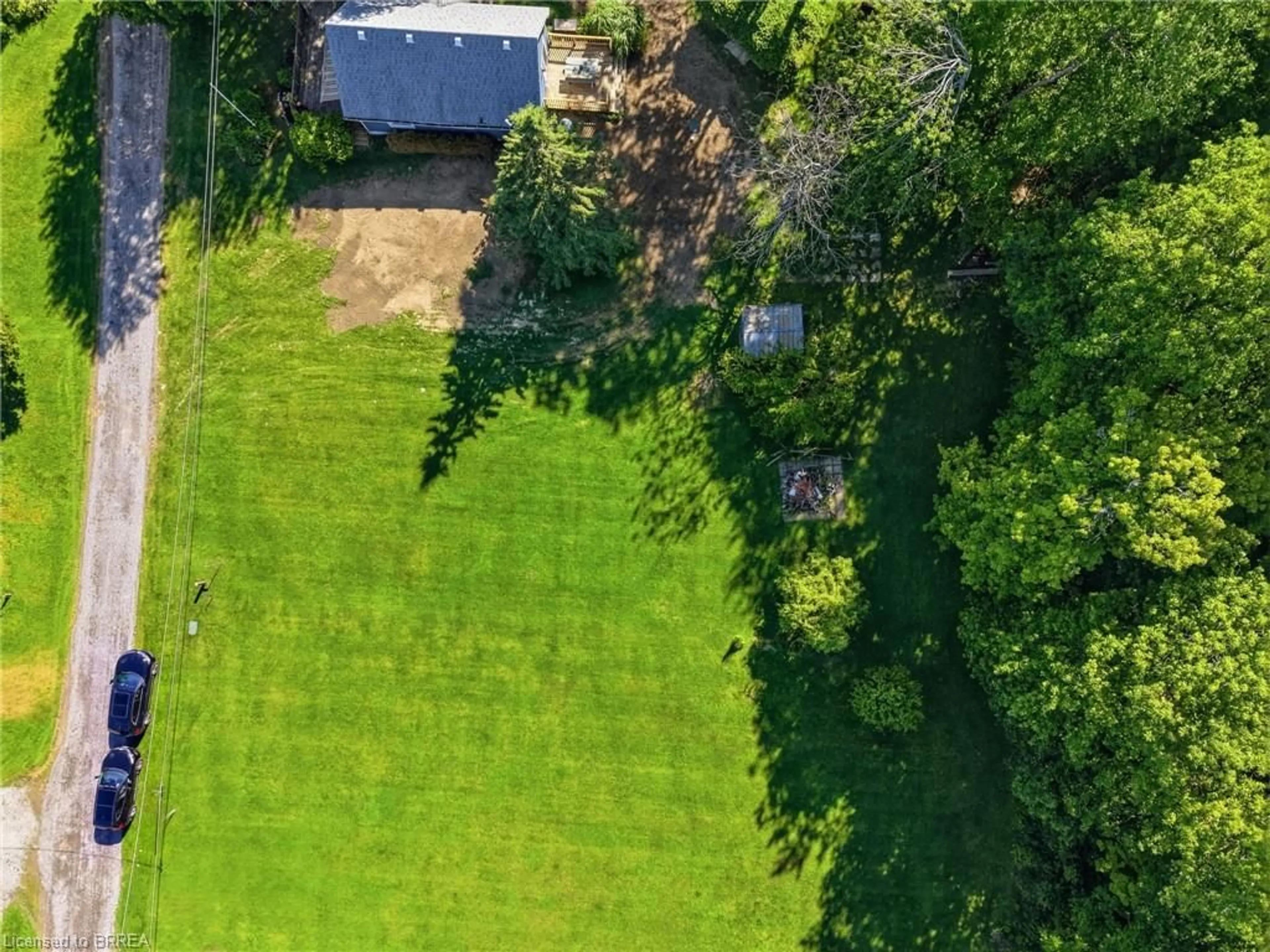 A pic from outside/outdoor area/front of a property/back of a property/a pic from drone, forest/trees view for 525 Avalon Lane, Port Dover Ontario N3Y 4K2