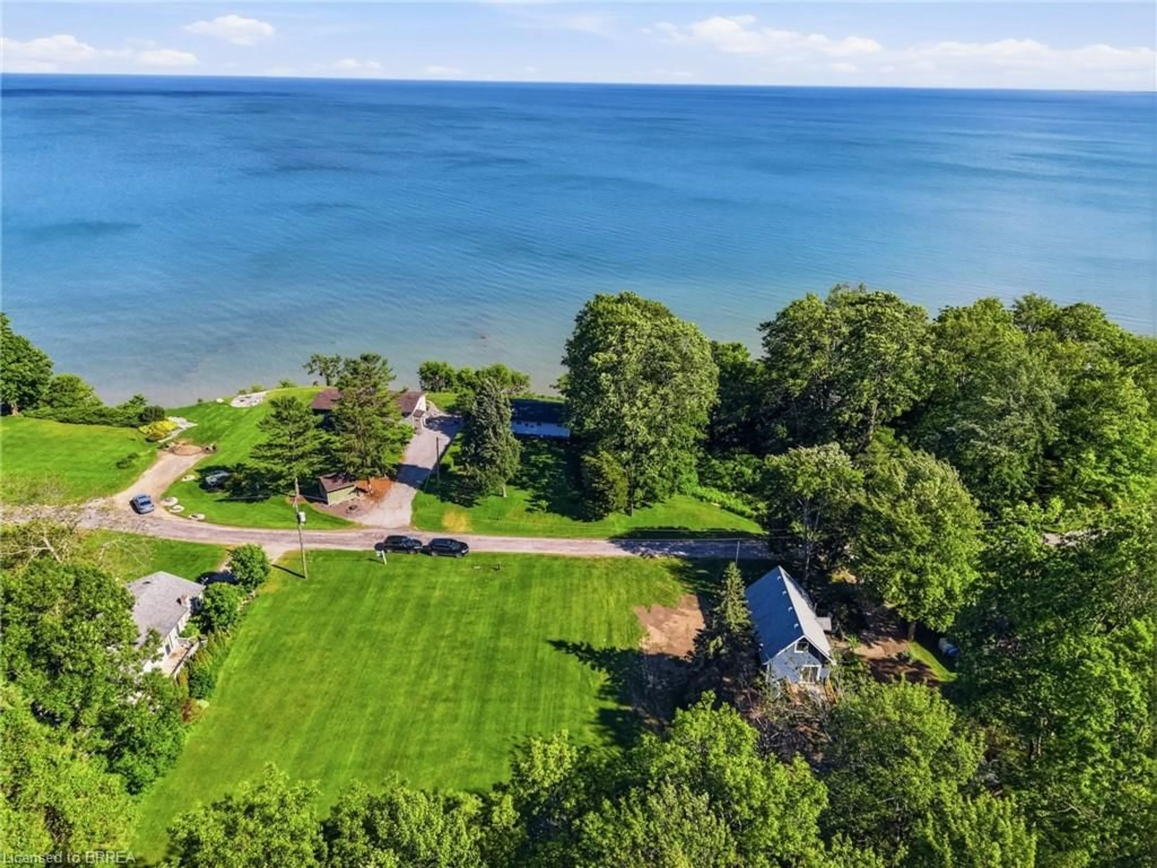 A pic from outside/outdoor area/front of a property/back of a property/a pic from drone, water/lake/river/ocean view for 525 Avalon Lane, Port Dover Ontario N3Y 4K2