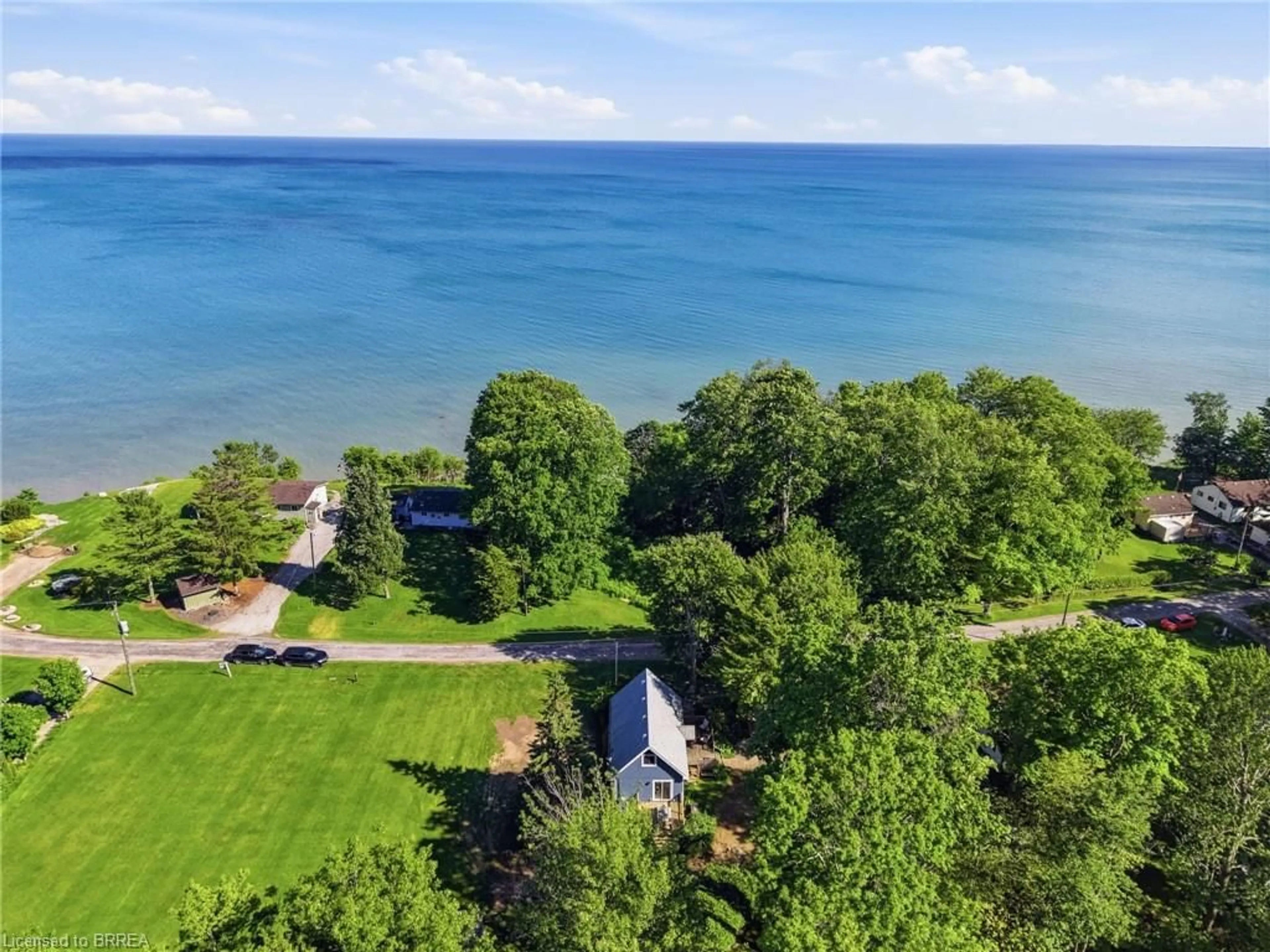 A pic from outside/outdoor area/front of a property/back of a property/a pic from drone, water/lake/river/ocean view for 525 Avalon Lane, Port Dover Ontario N3Y 4K2
