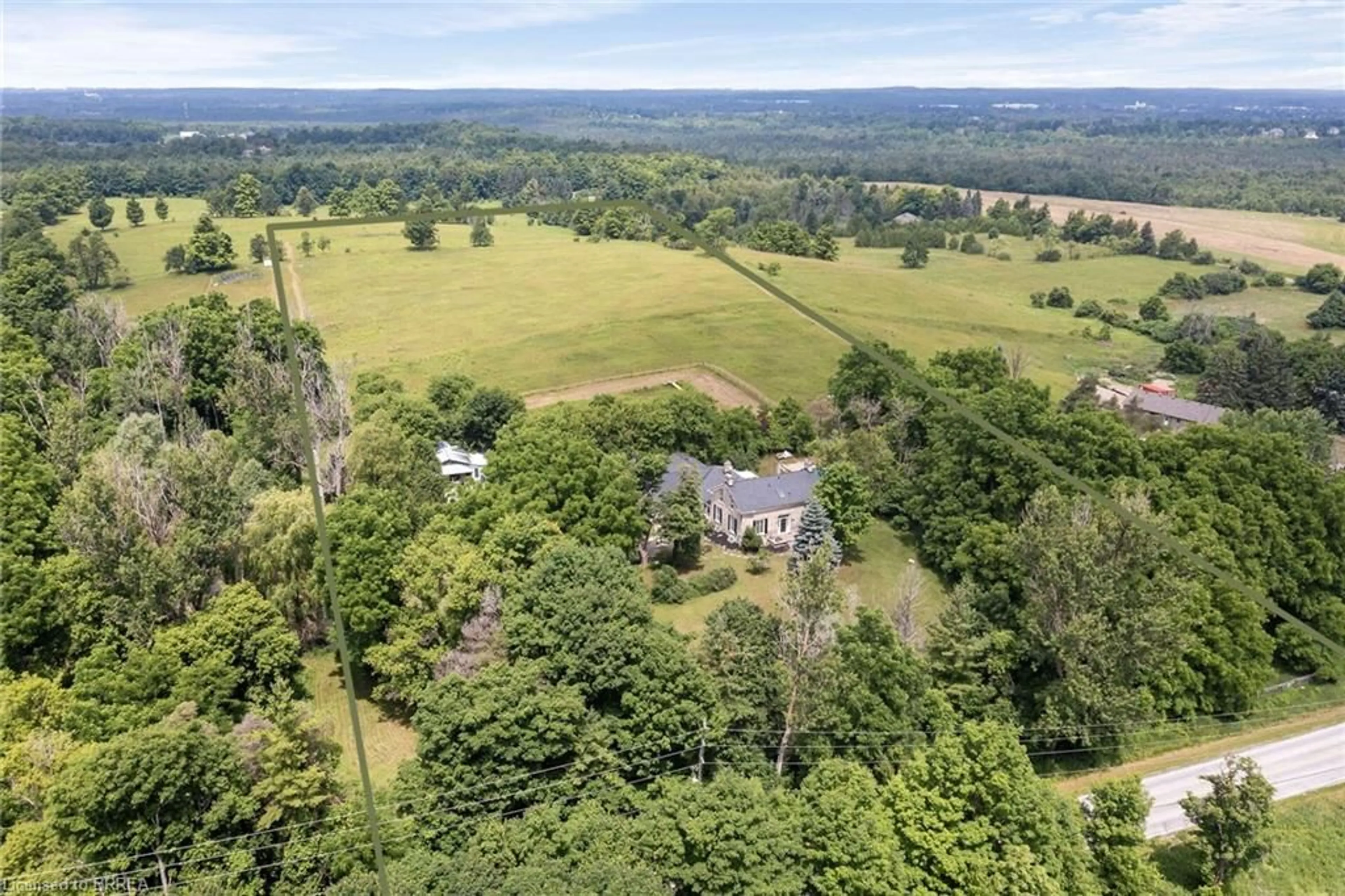A pic from outside/outdoor area/front of a property/back of a property/a pic from drone, forest/trees view for 5595 25 Side Road, Acton Ontario L7J 2L7