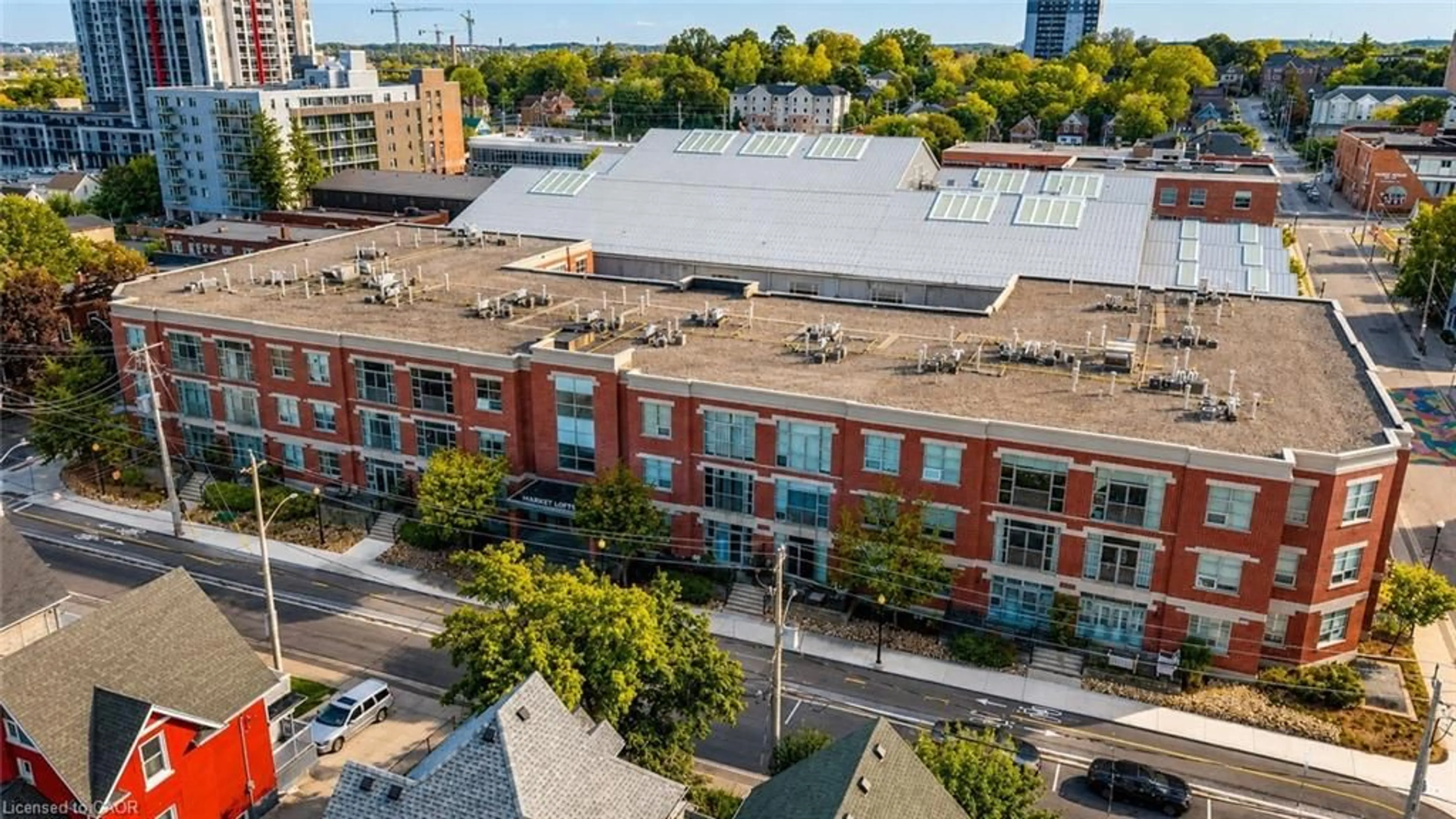 A pic from outside/outdoor area/front of a property/back of a property/a pic from drone, city buildings view from balcony for 165 Duke St #105, Kitchener Ontario N2H 6T8