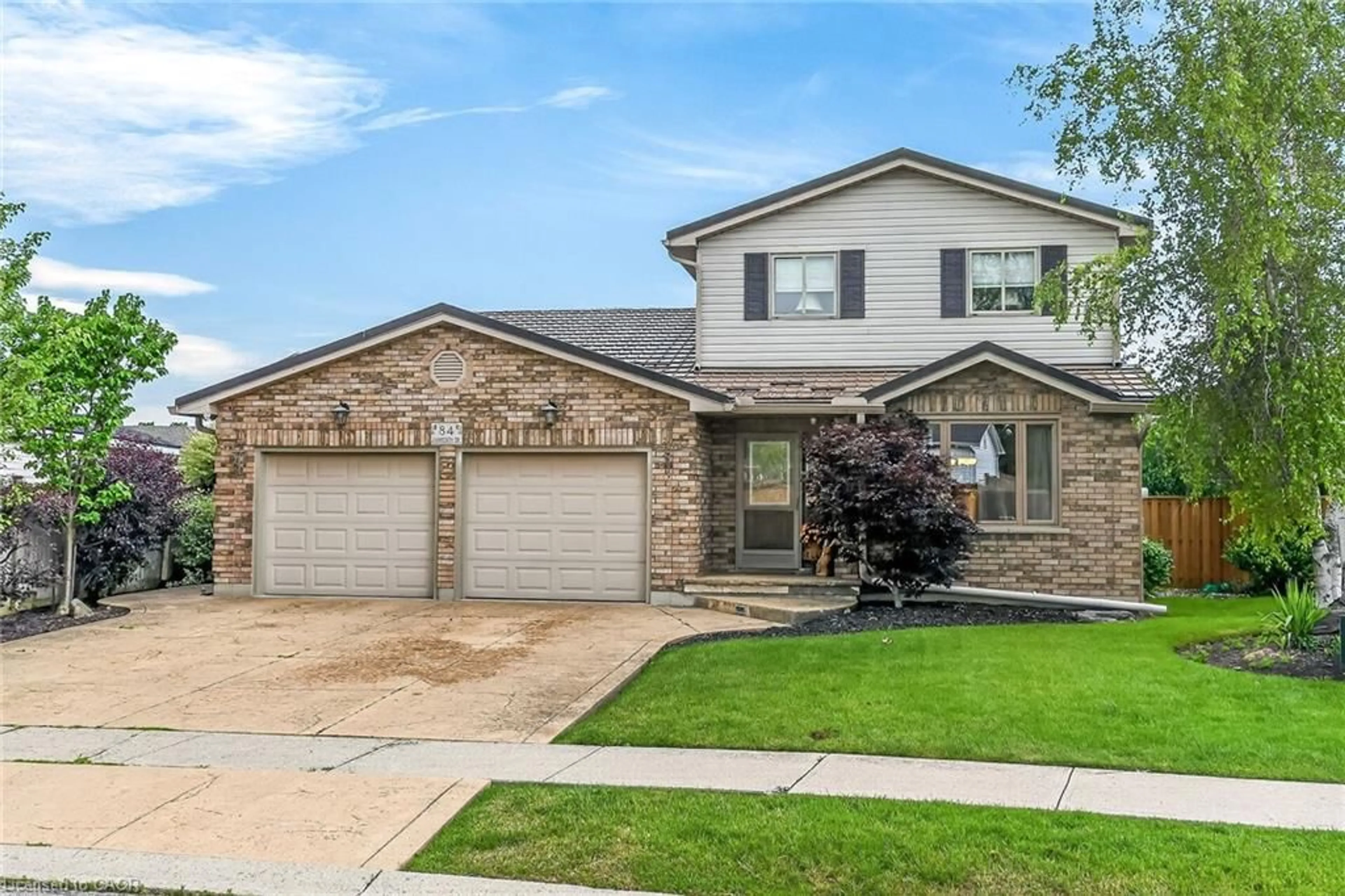 Home with brick exterior material, street for 84 Jamieson Dr, Caledonia Ontario N3W 2M4