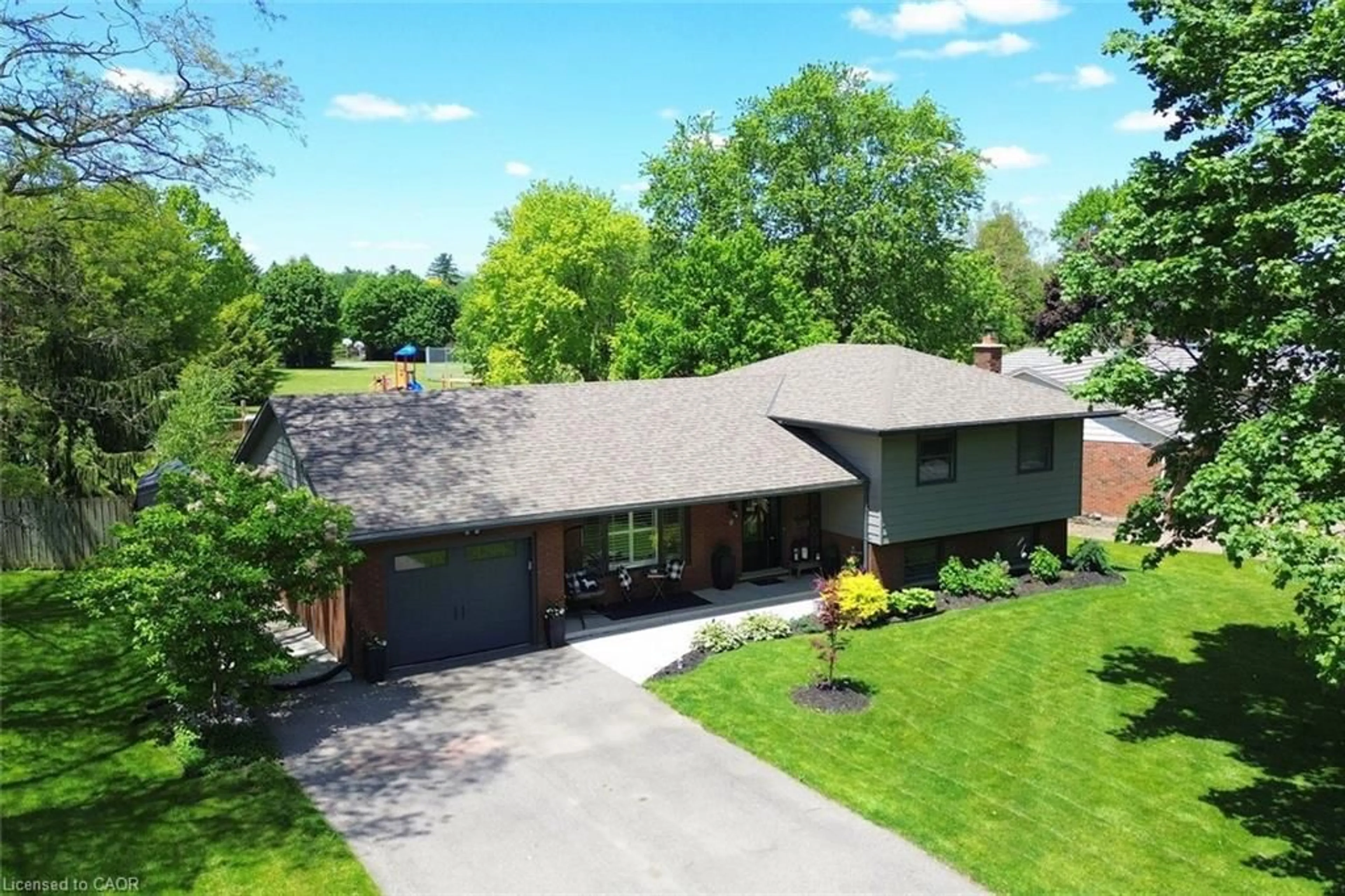 A pic from outside/outdoor area/front of a property/back of a property/a pic from drone, street for 8 Sheridan Blvd, Simcoe Ontario N3Y 4W4