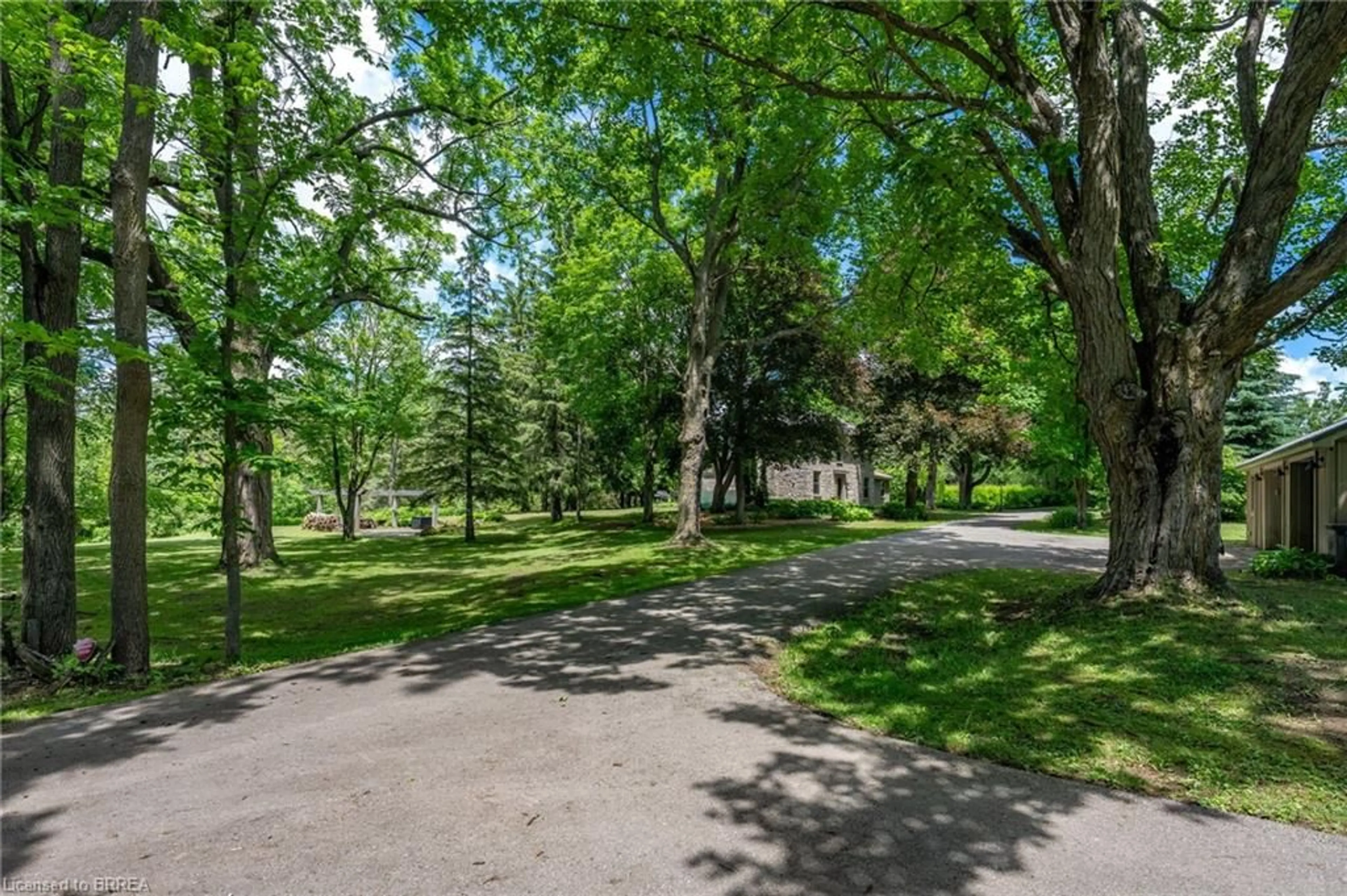 A pic from outside/outdoor area/front of a property/back of a property/a pic from drone, forest/trees view for 5405 Wellington Road 52, Erin Ontario N0B 1T0