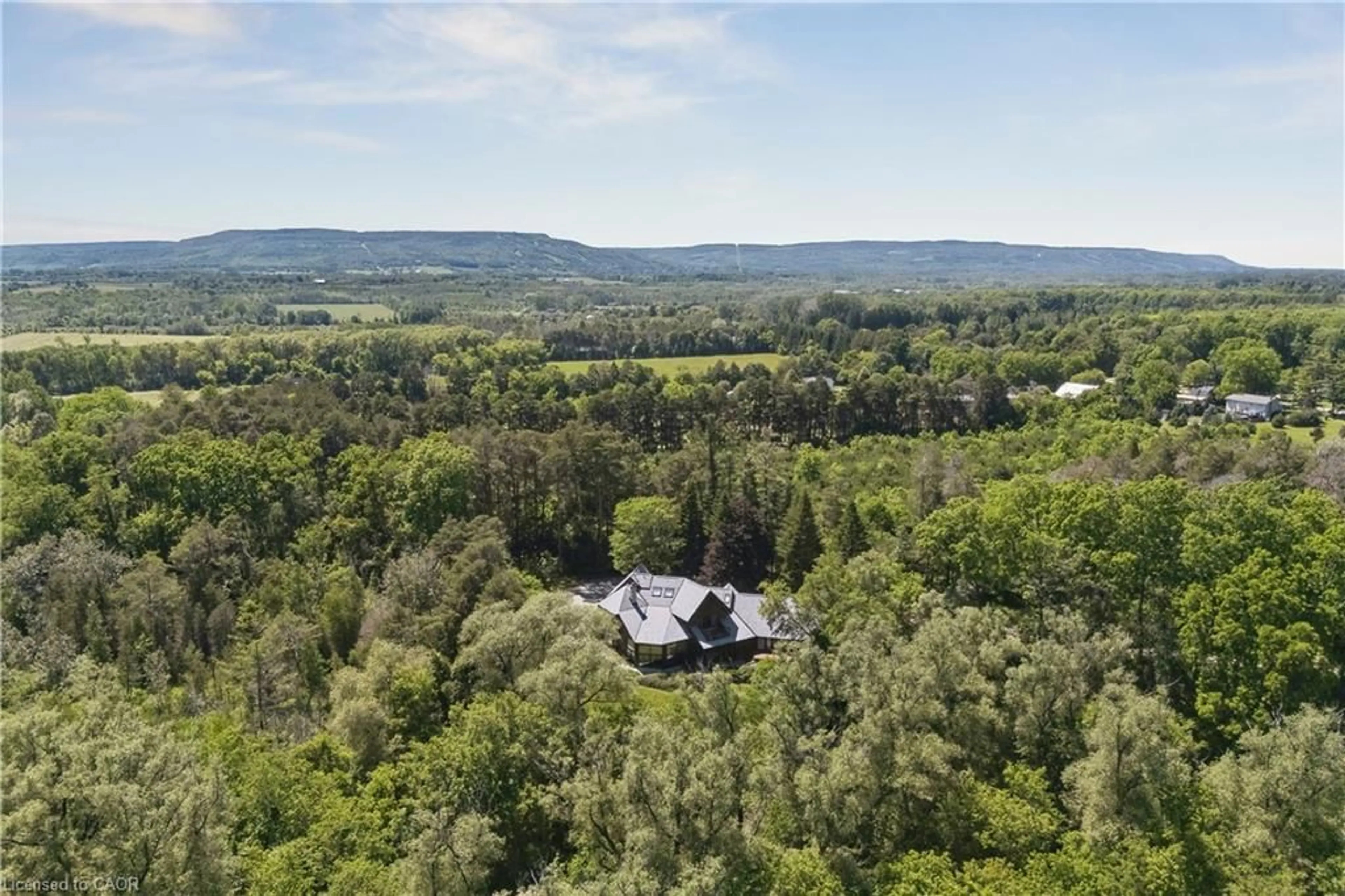 A pic from outside/outdoor area/front of a property/back of a property/a pic from drone, forest/trees view for 7665 36/37 Nottawasaga Sideroad, Nottawa Ontario L0M 1P0