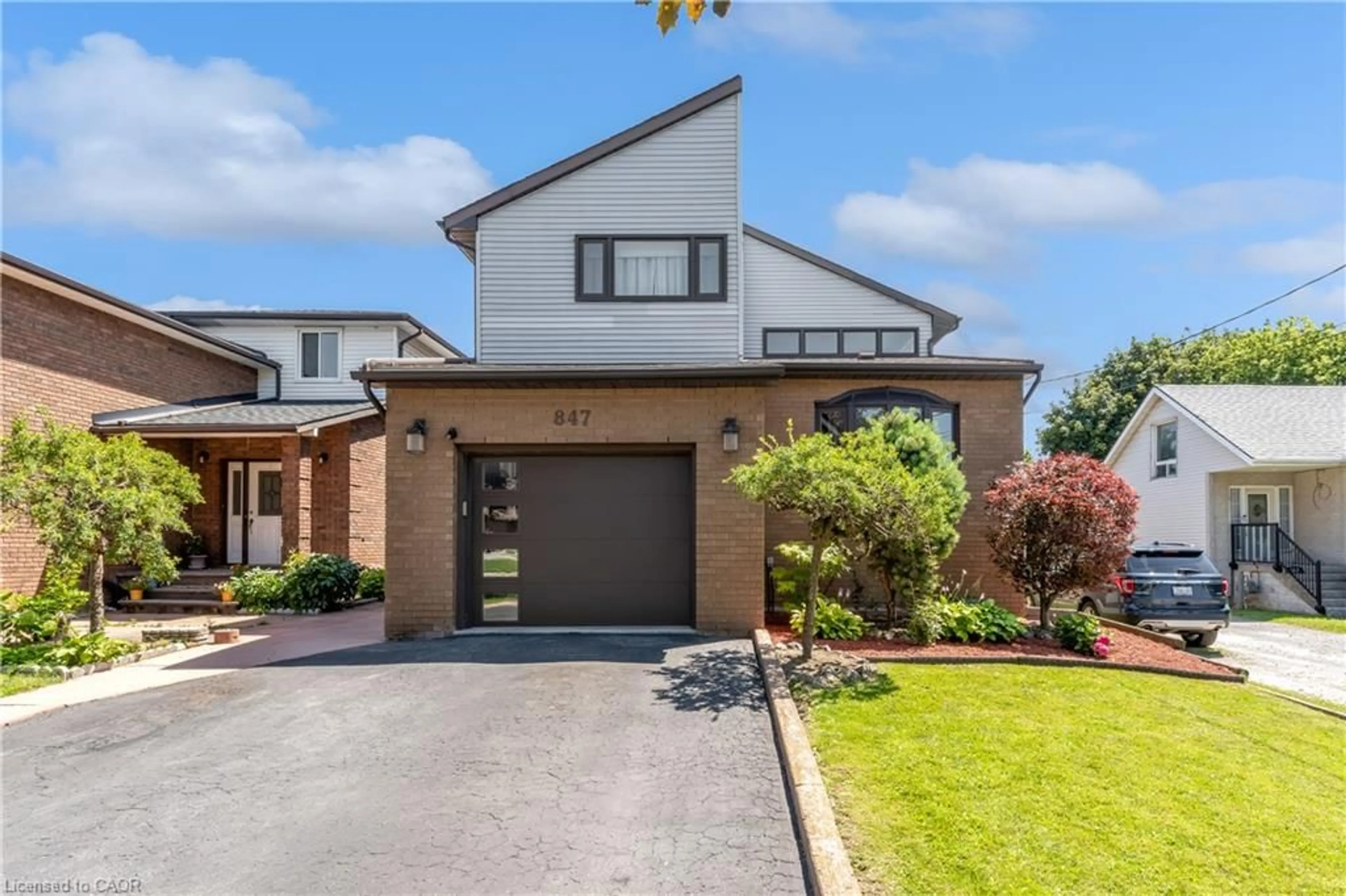 Home with brick exterior material, street for 847 West 5th St, Hamilton Ontario L9C 5R4