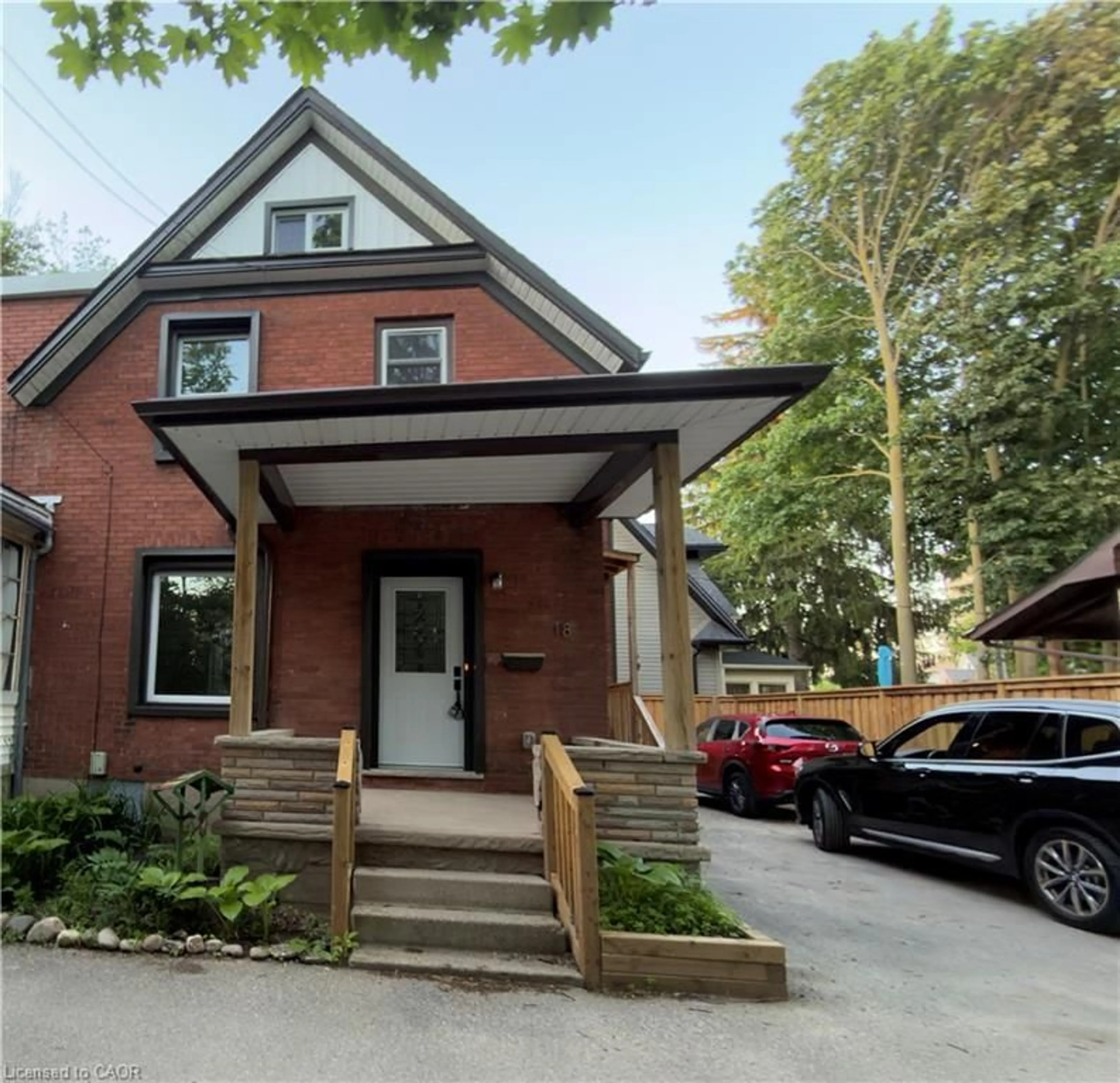 Home with brick exterior material, street for 18 Miehm Pl, Kitchener Ontario N2H 2K9