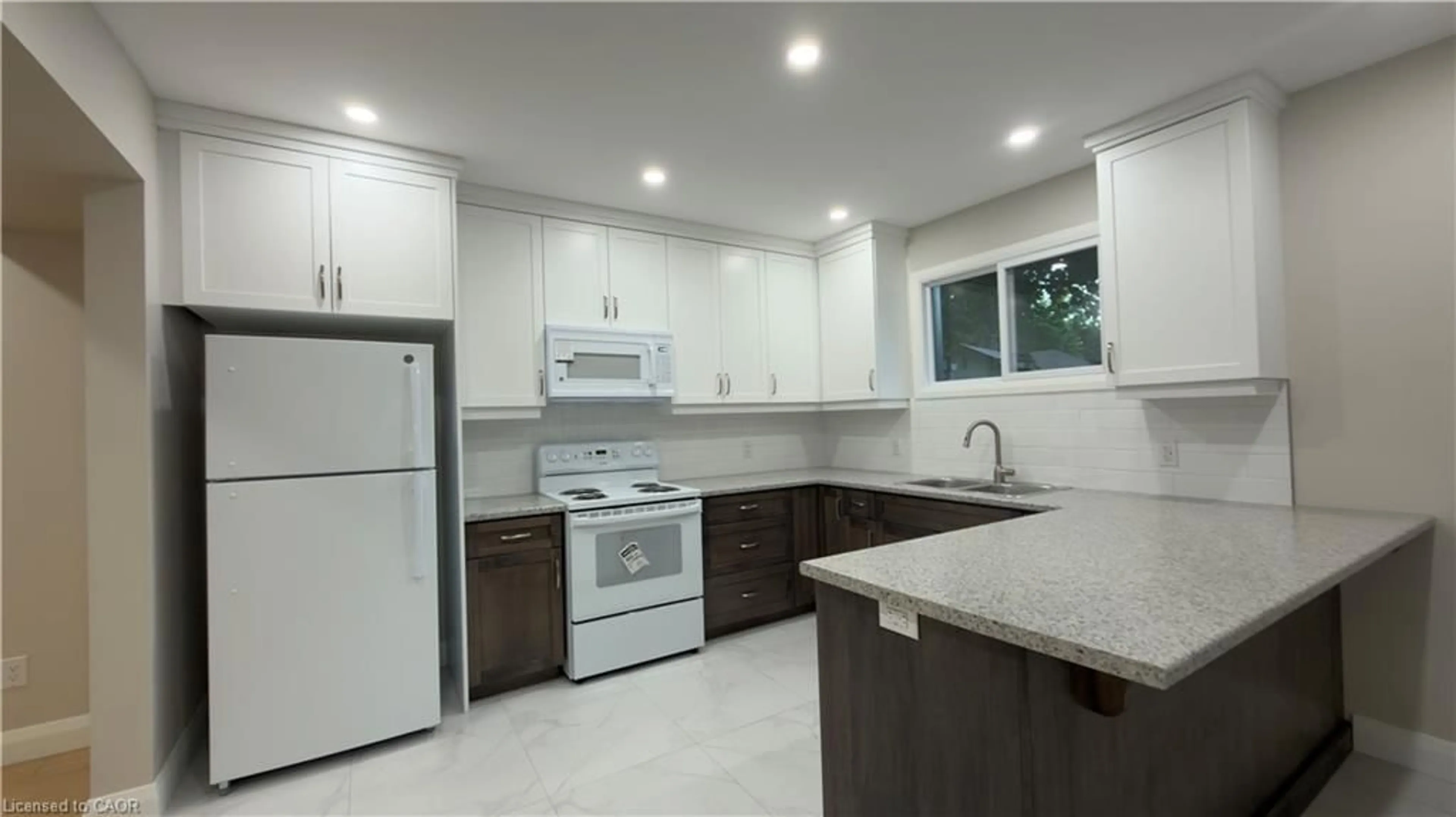 Open concept kitchen, ceramic/tile floor for 18 Miehm Pl, Kitchener Ontario N2H 2K9