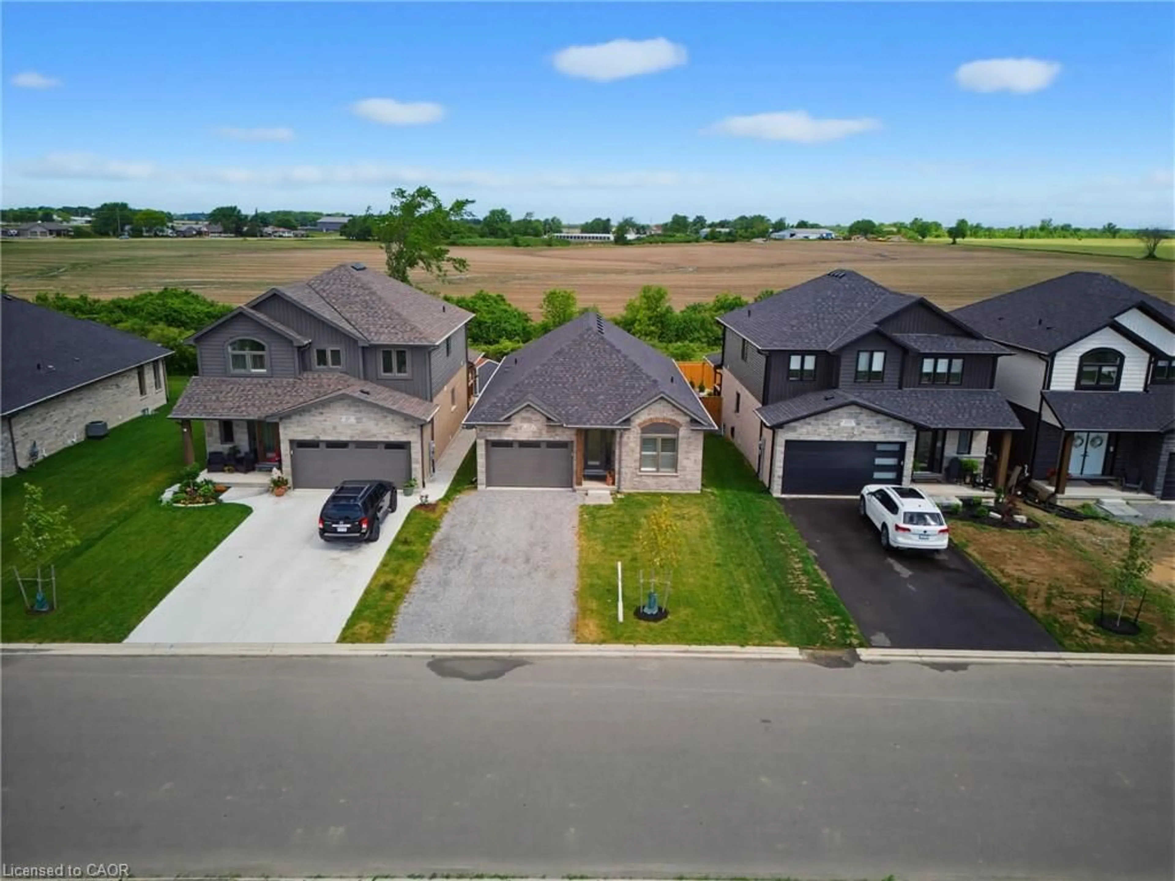 A pic from outside/outdoor area/front of a property/back of a property/a pic from drone, street for 131 Craddock Blvd, Haldimand Ontario N0A 1J0