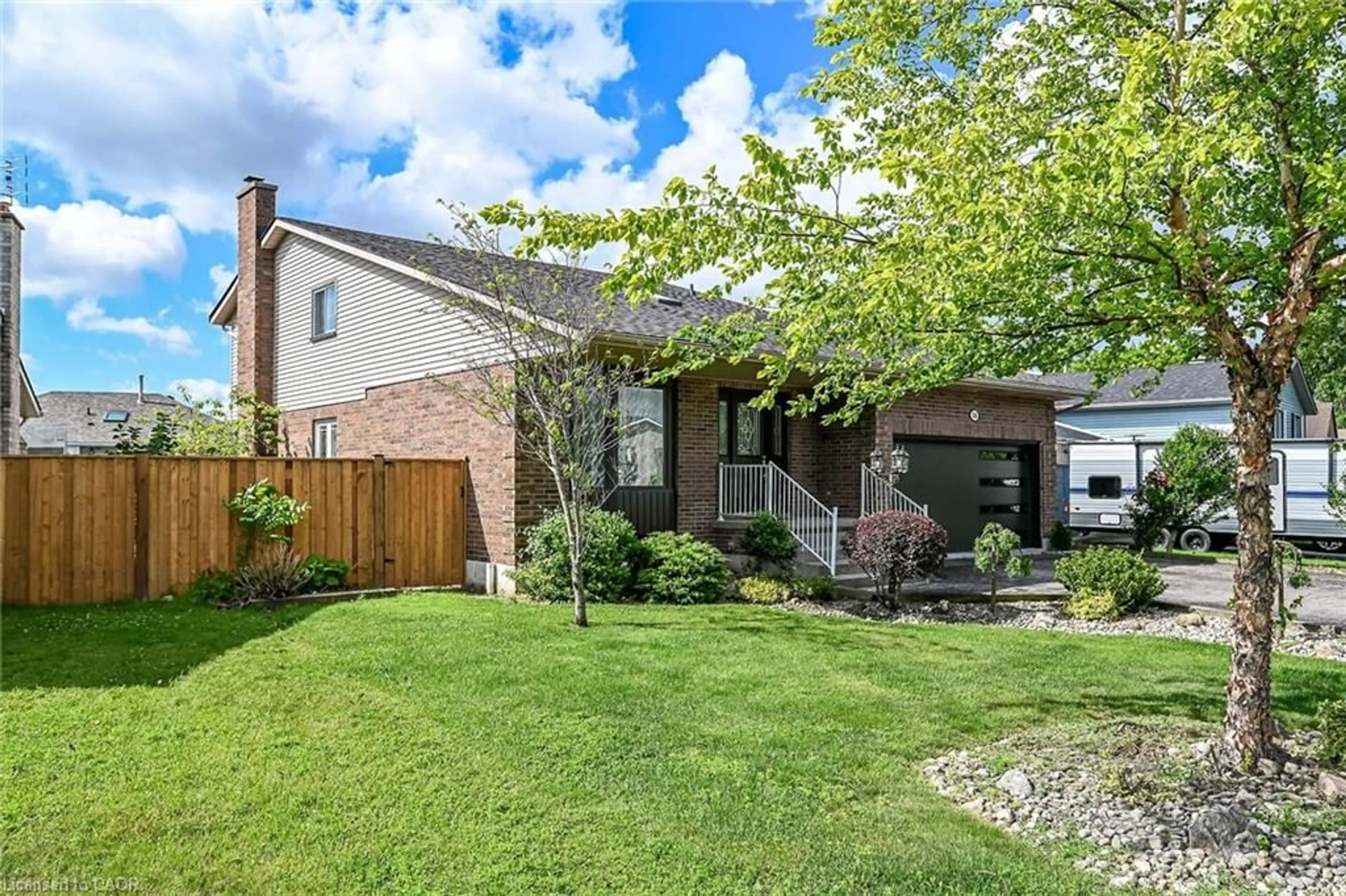Home with brick exterior material, street for 26 Mcmaster Dr, Caledonia Ontario N3W 1G9
