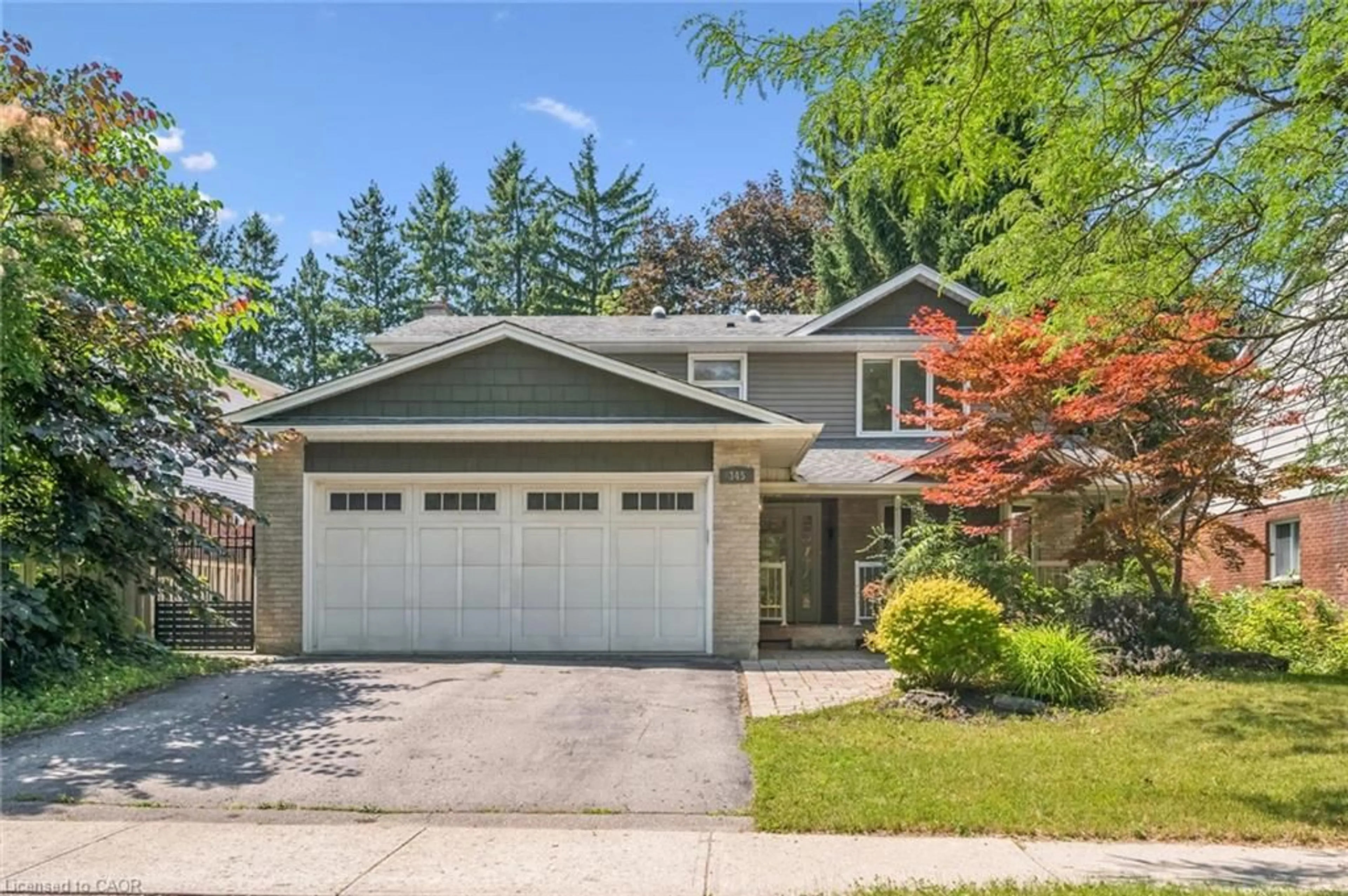 Home with vinyl exterior material, street for 345 Beechlawn Dr, Waterloo Ontario N2L 5L8