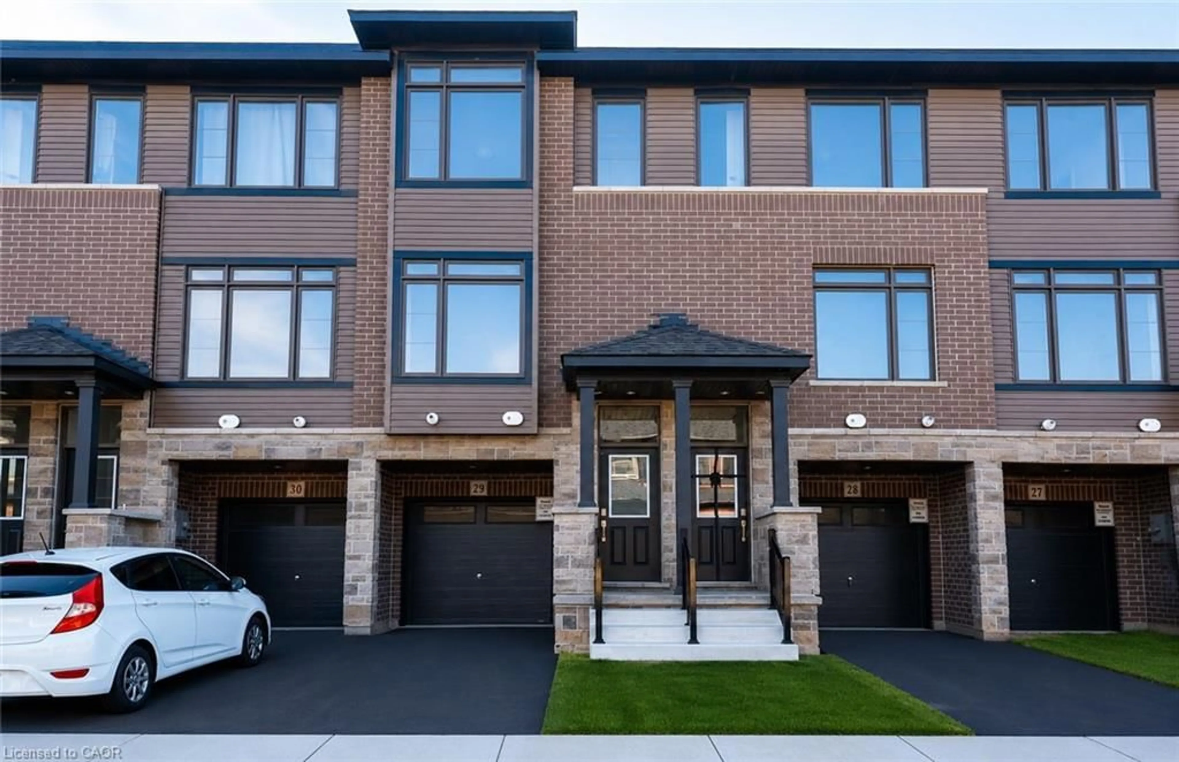 Home with brick exterior material, street for 120 Court Dr #29, Paris Ontario N3L 0N2