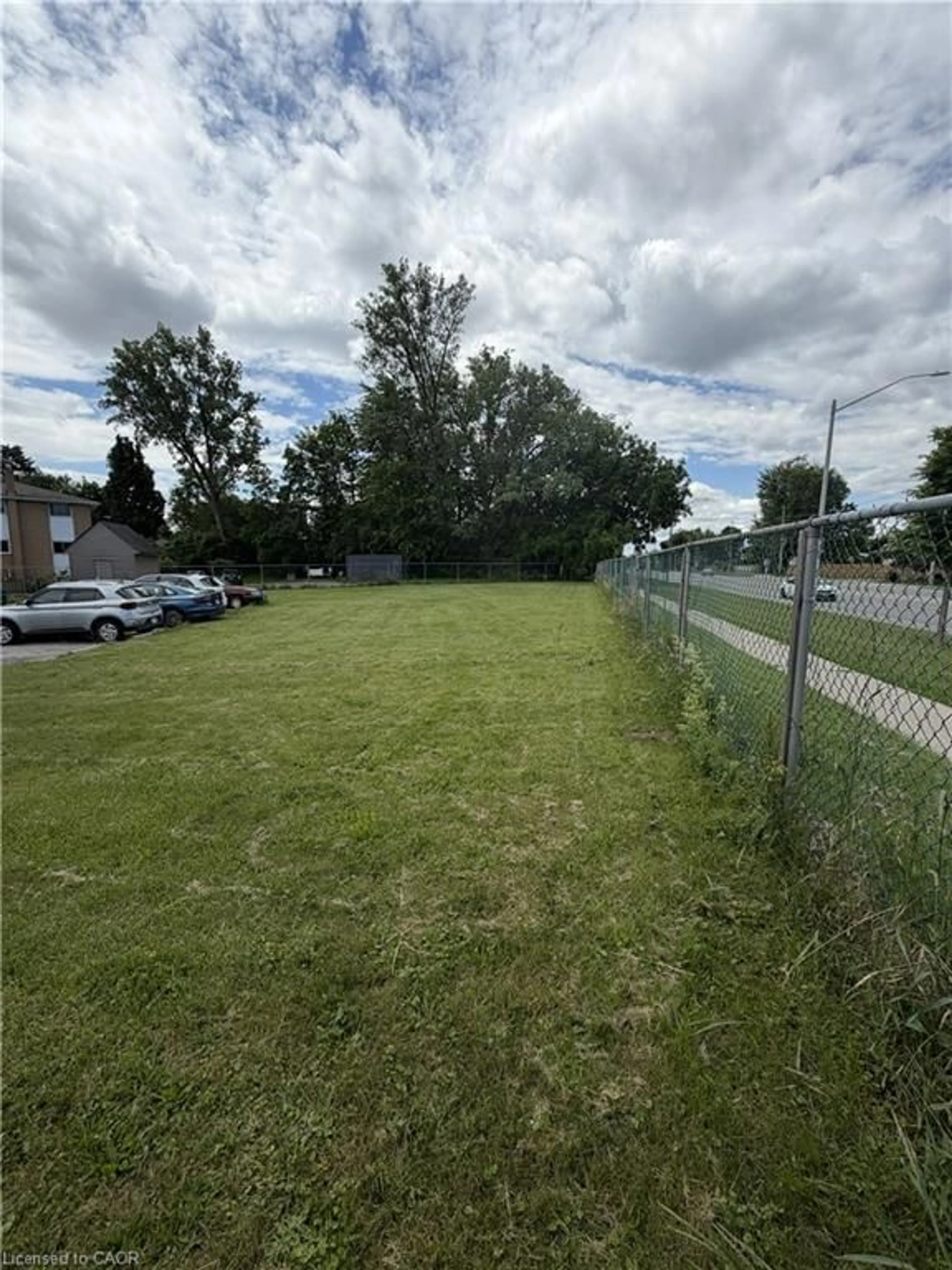 A pic from outside/outdoor area/front of a property/back of a property/a pic from drone, street for 26 Carnaby Cres, Kitchener Ontario N2A 1M7