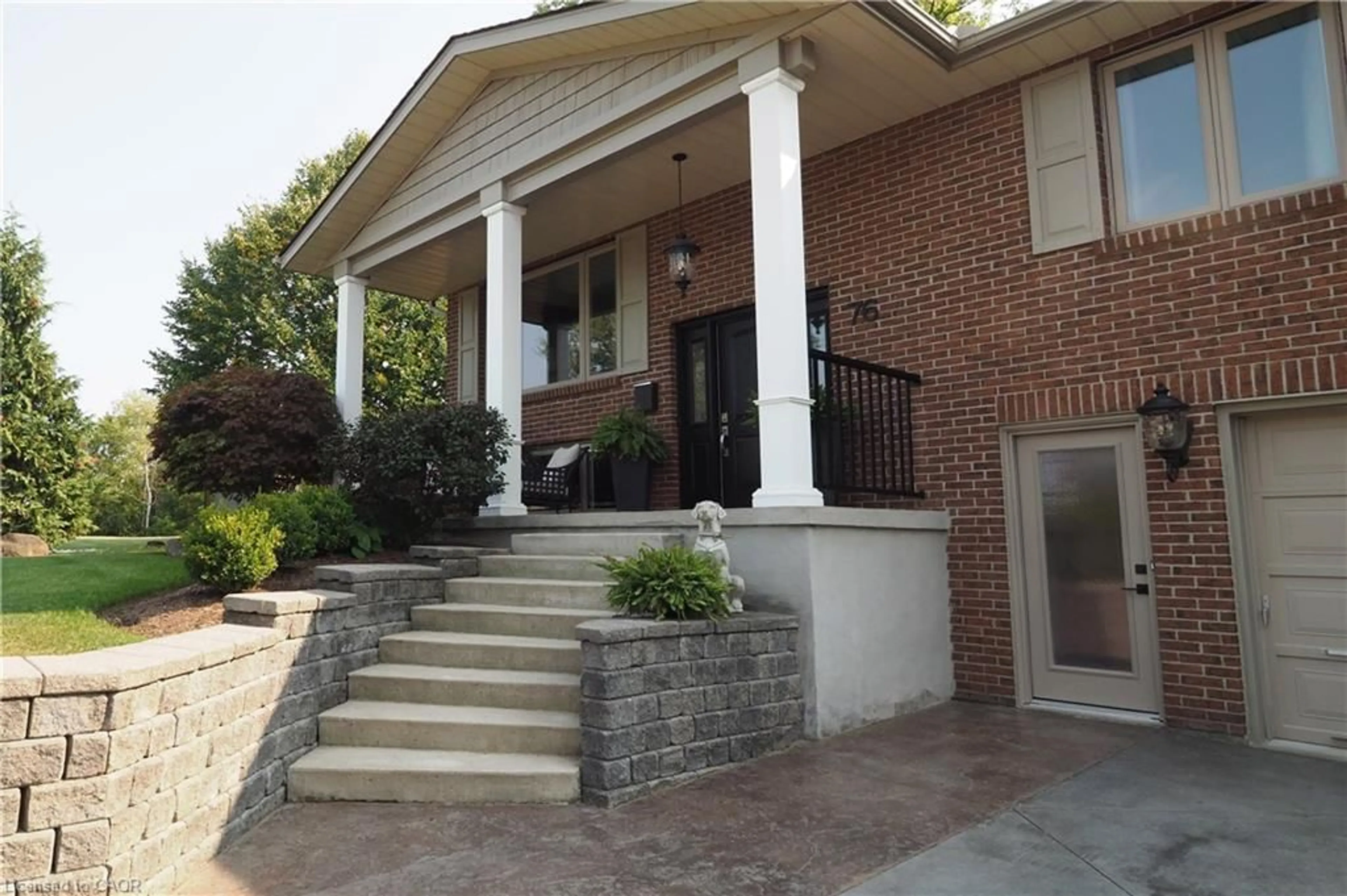 Home with brick exterior material, street for 76 Flaxmill Dr, Conestogo Ontario N0B 1N0