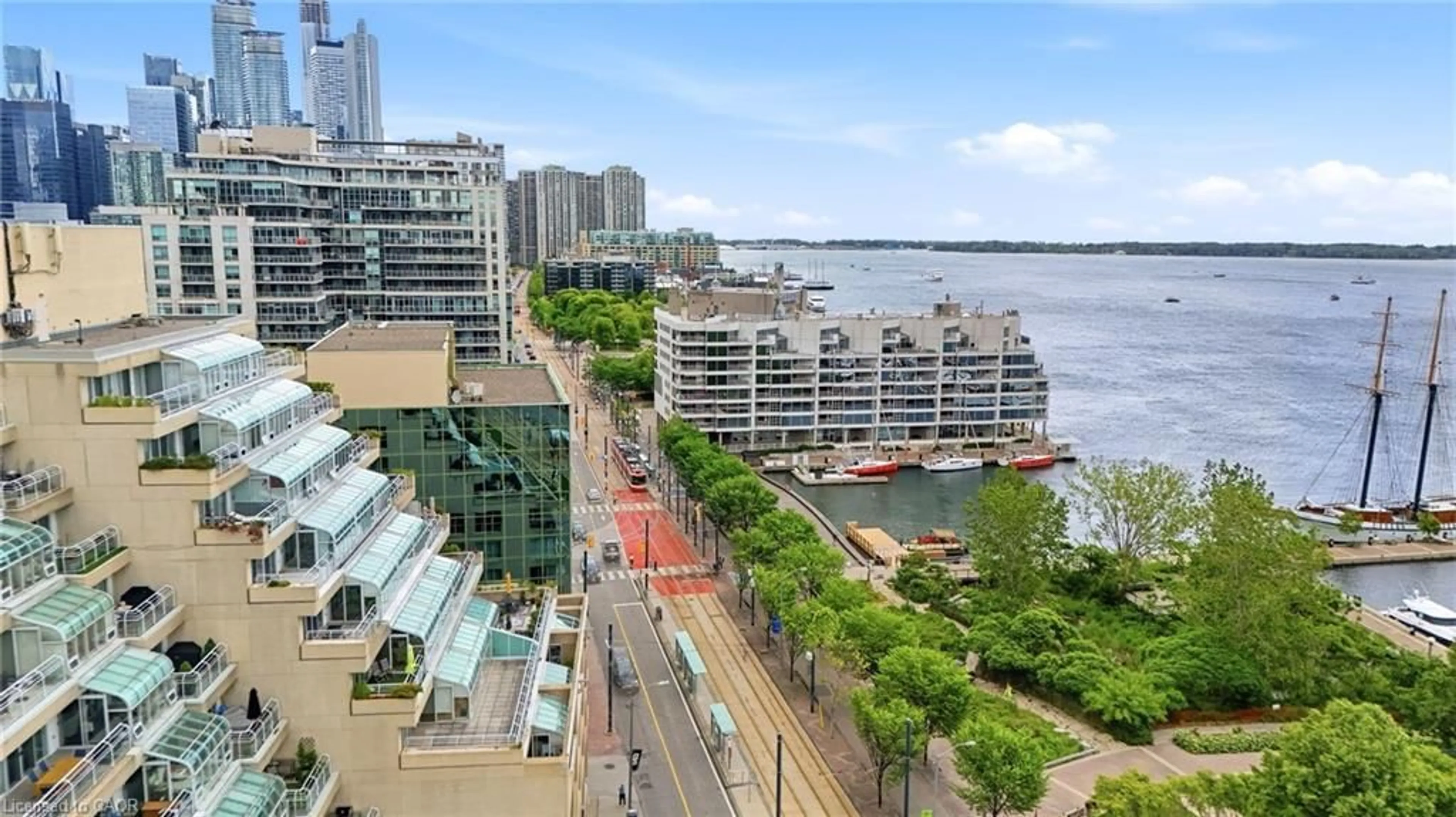 A pic from outside/outdoor area/front of a property/back of a property/a pic from drone, water/lake/river/ocean view for 460 Queens Quay Way #803E, Toronto Ontario M5V 2Y5