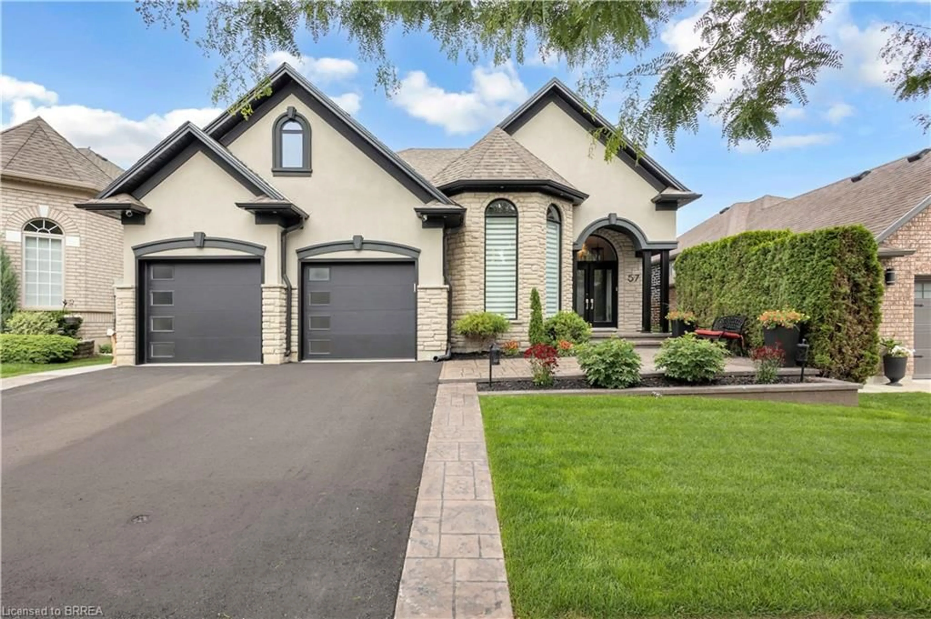 Home with brick exterior material, street for 57 Carmichael Cres, Brantford Ontario N3R 8A8