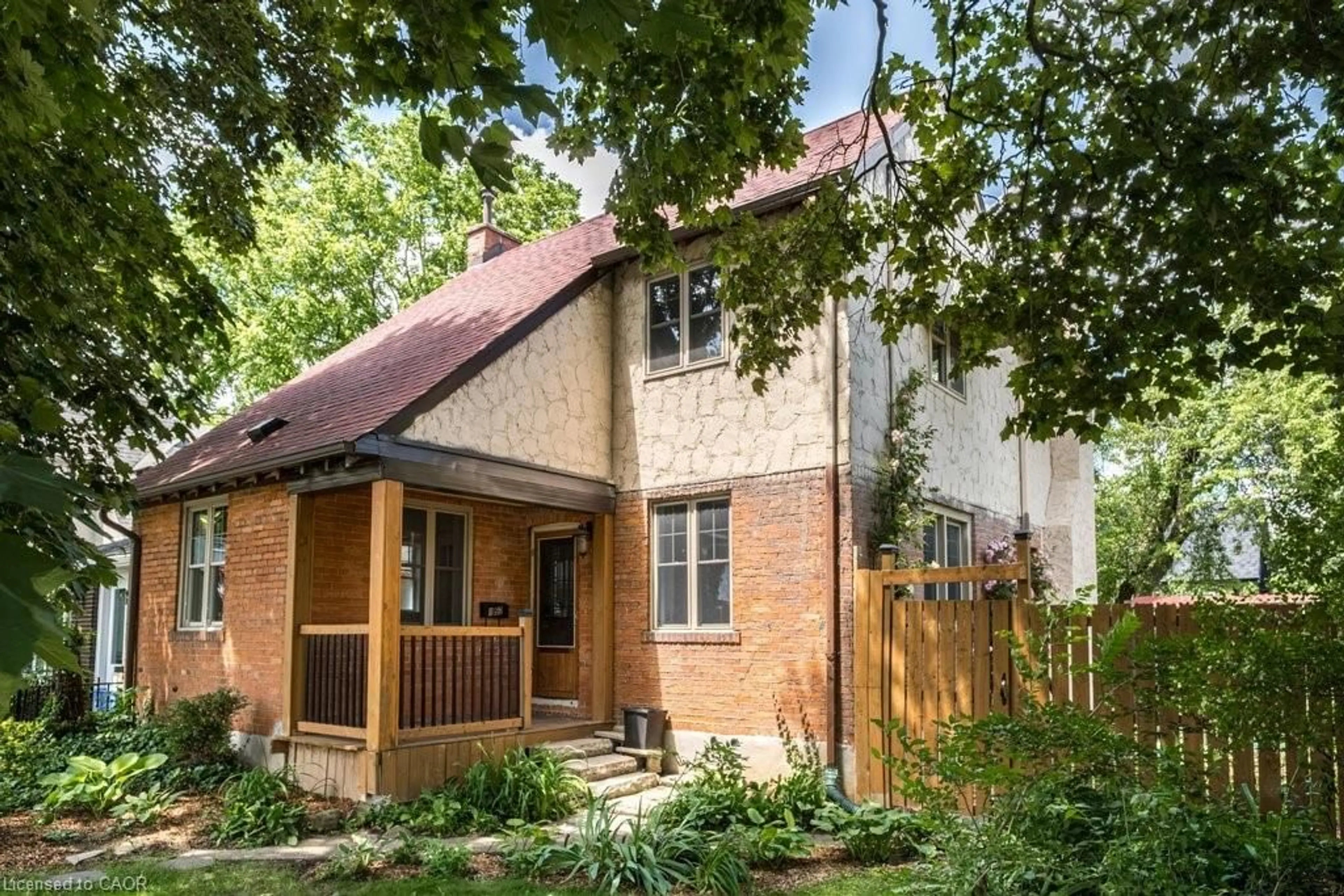 Home with brick exterior material, street for 152 Glen Rd, Hamilton Ontario L8S 3N1