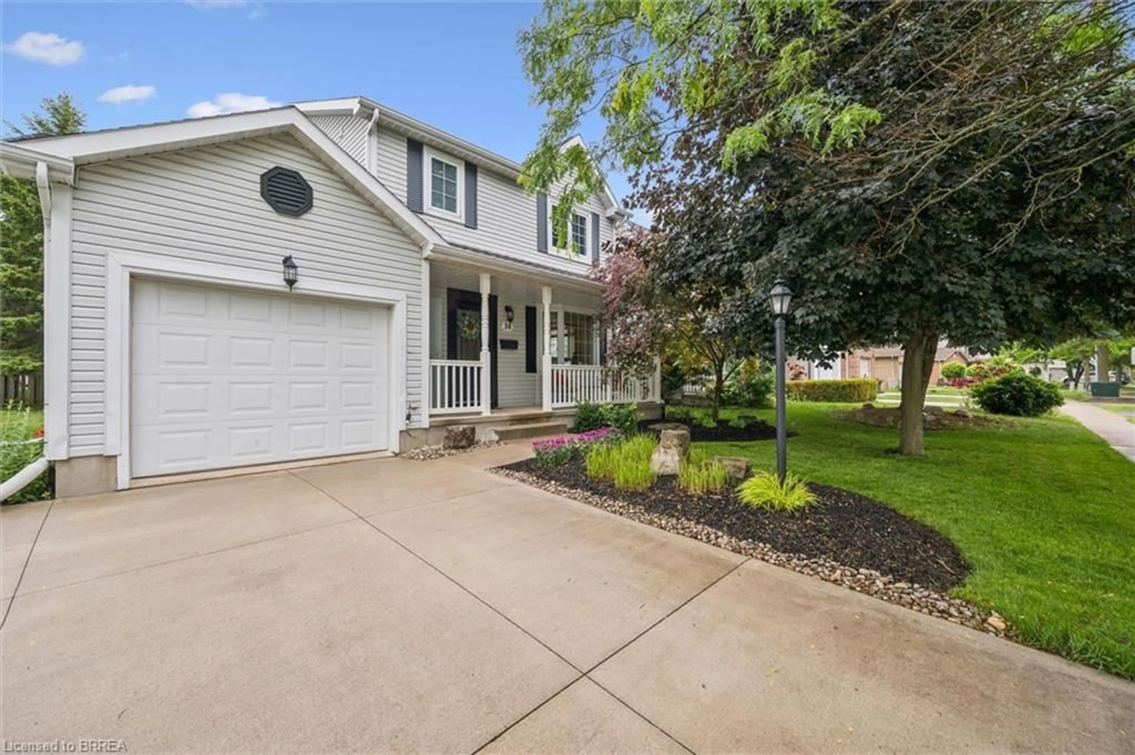 Home with vinyl exterior material, street for 36 Algonquin Rd, Woodstock Ontario N4T 1R8