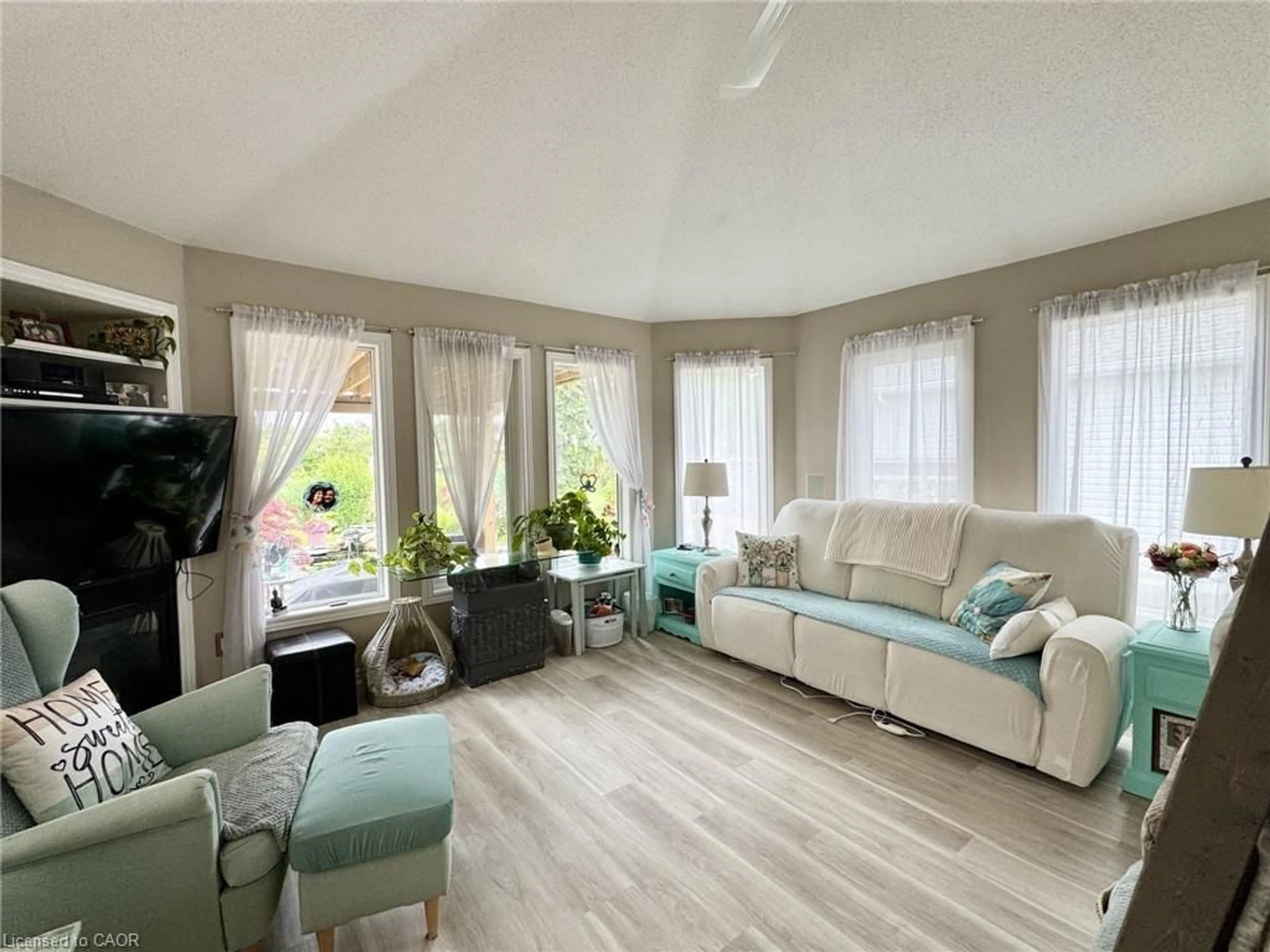 Living room with furniture, wood/laminate floor for 4 Balsam Trail, Port Rowan Ontario N0E 1M0