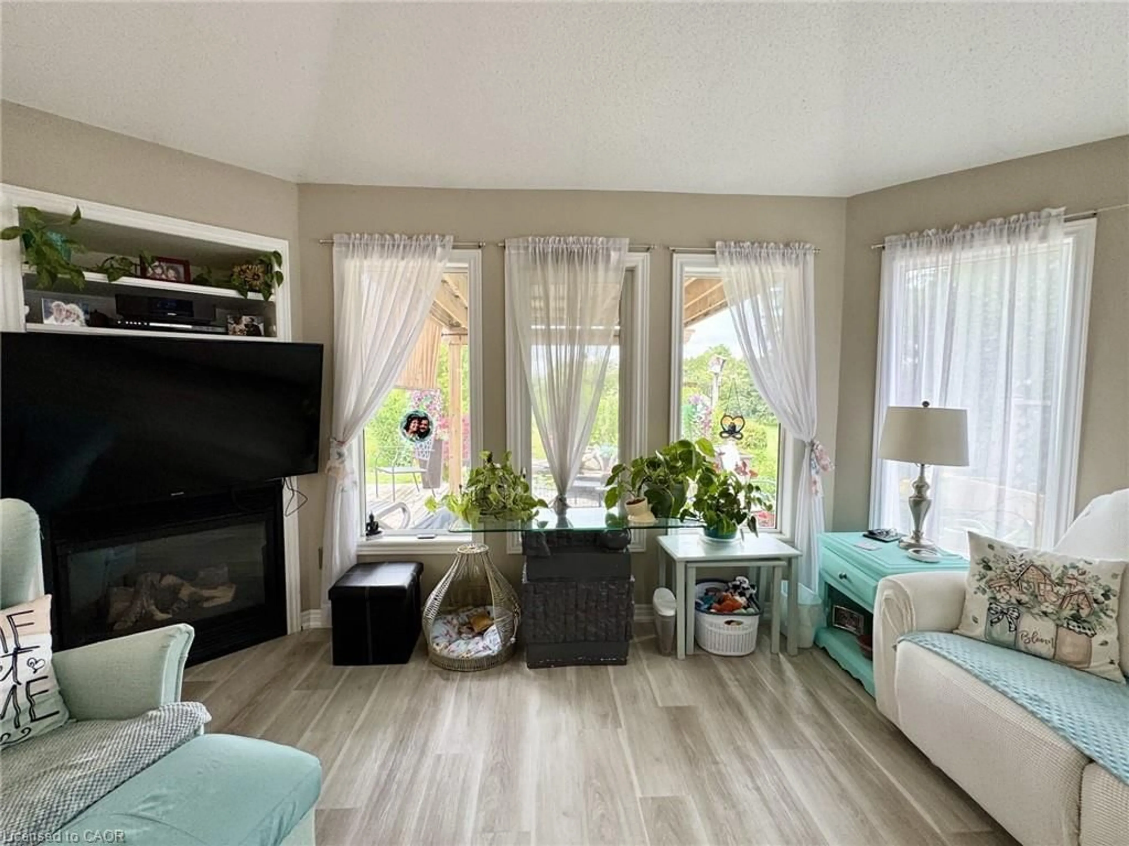 Living room with furniture, wood/laminate floor for 4 Balsam Trail, Port Rowan Ontario N0E 1M0