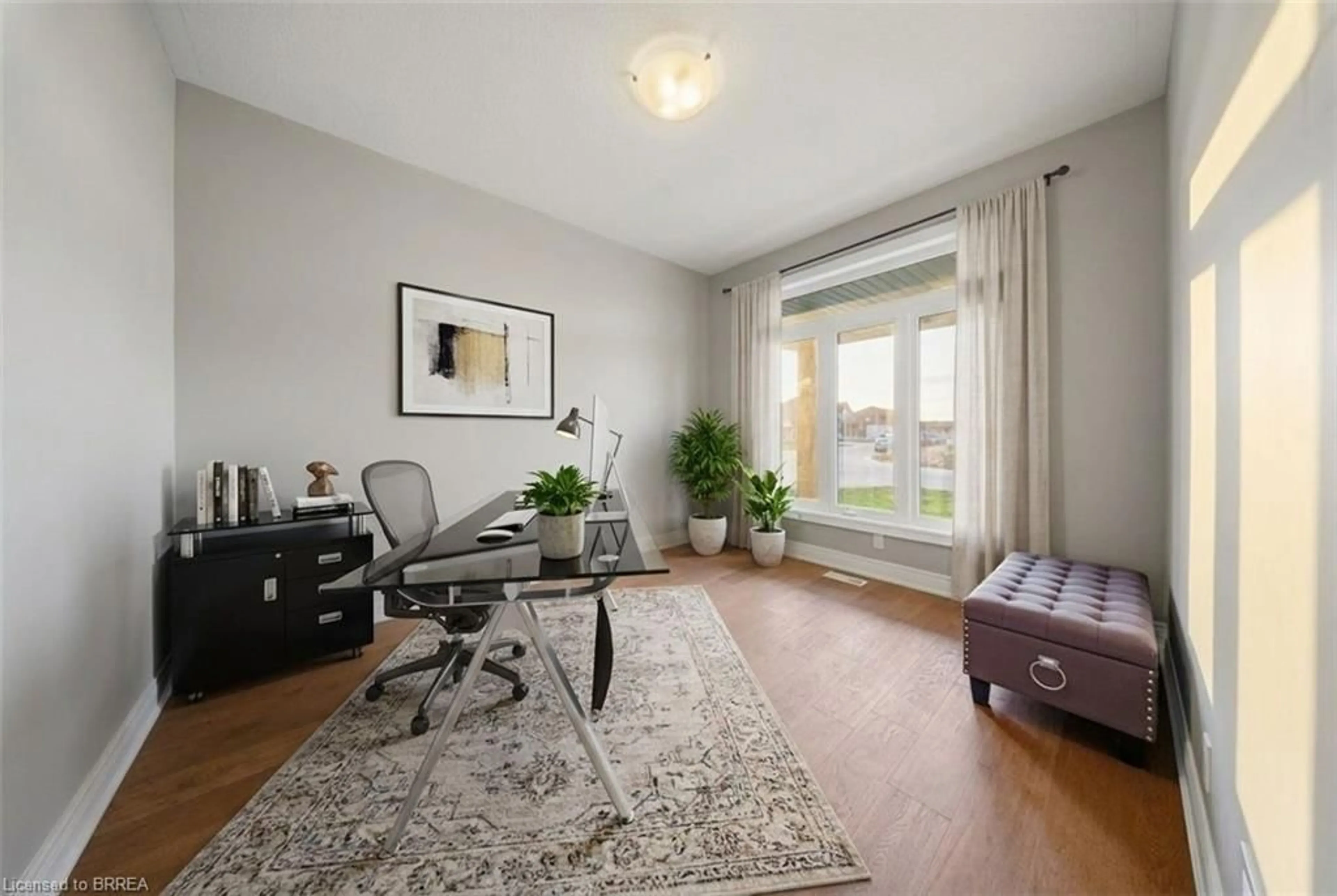 Living room with furniture, wood/laminate floor for 105 Craddock Blvd, Jarvis Ontario N0A 1J0