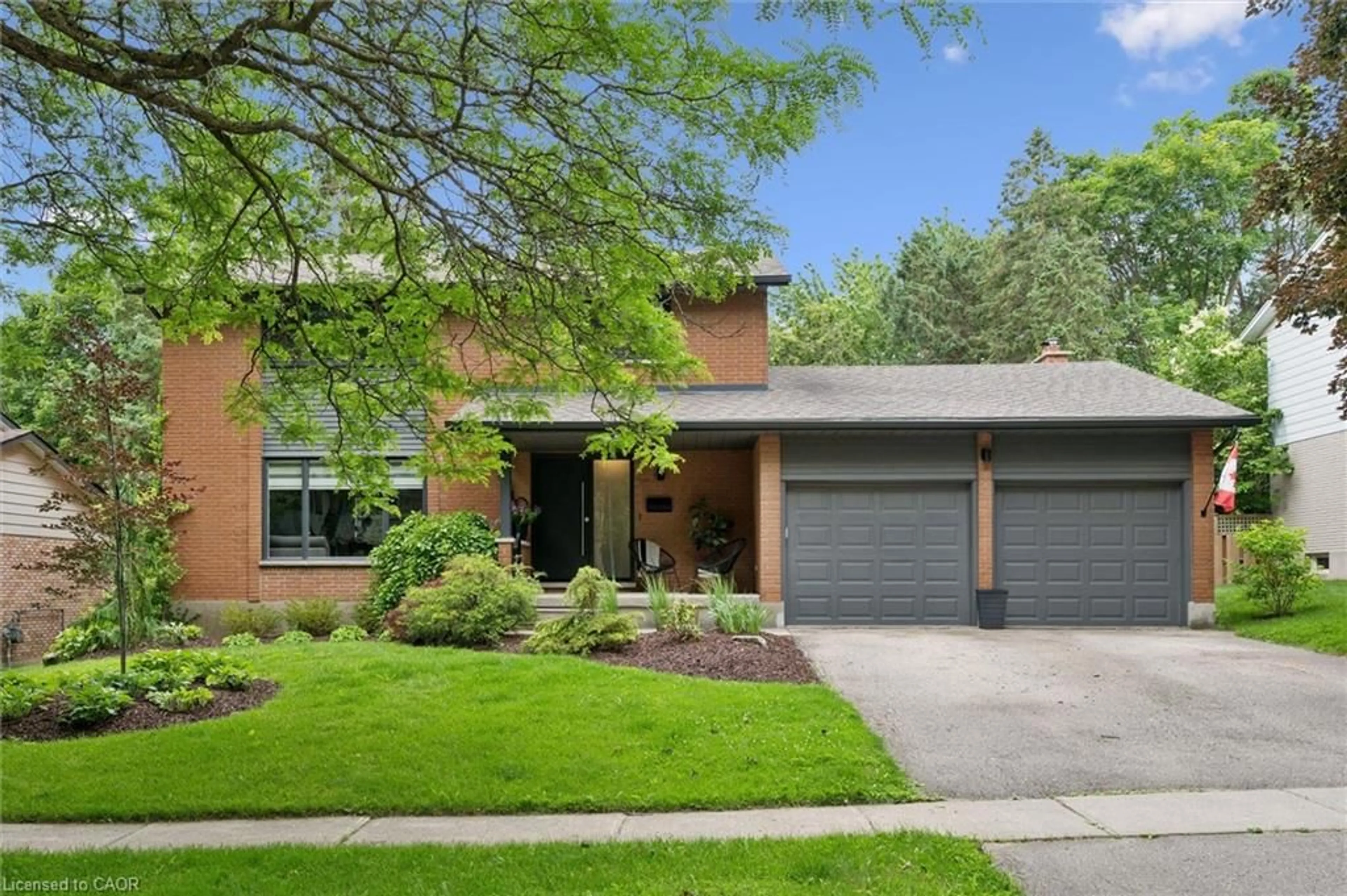 Home with brick exterior material, street for 40 Walnut Dr, Guelph Ontario N1E 4B3