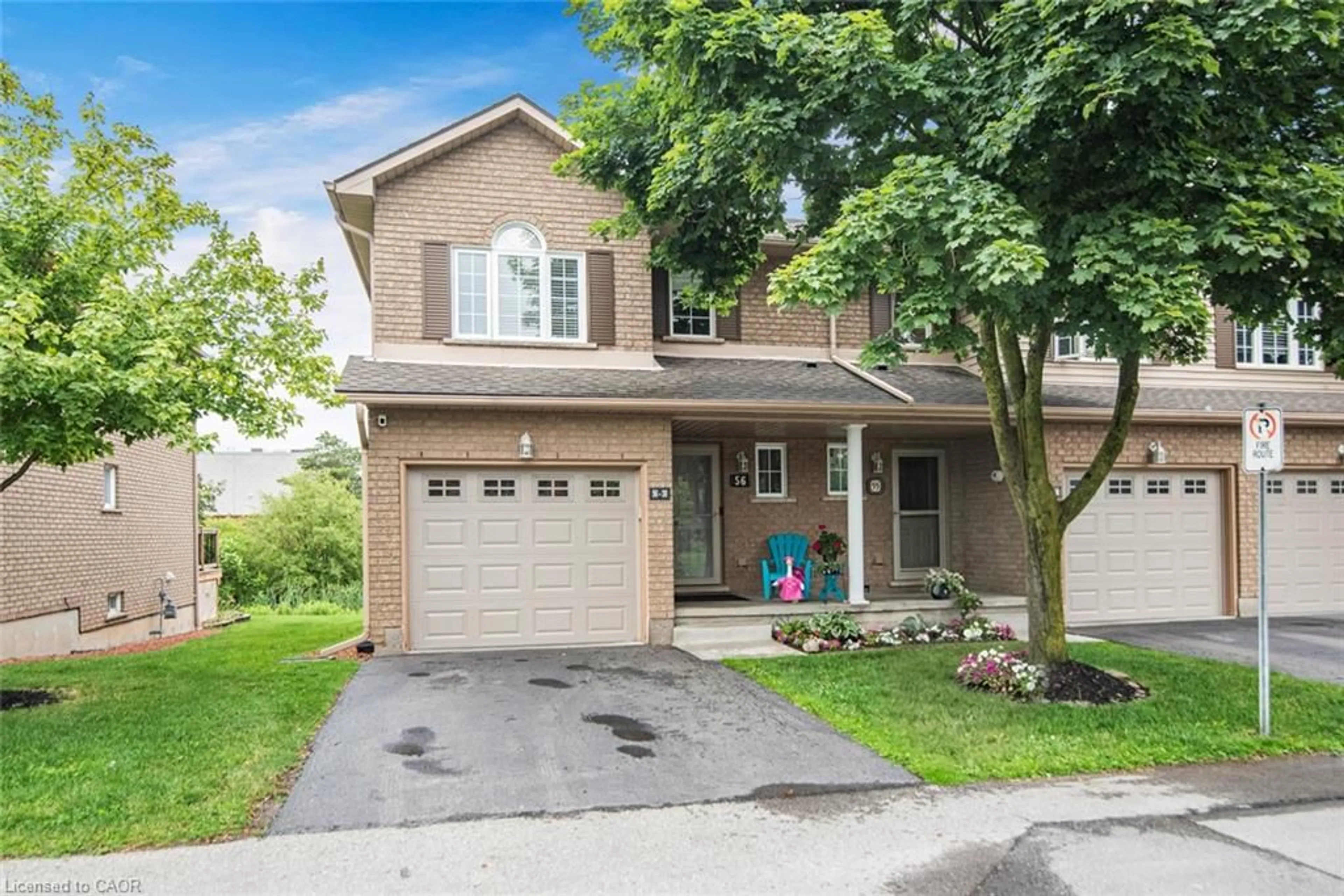 Home with brick exterior material, street for 30 Braemar Ave #56, Caledonia Ontario N3W 2M1