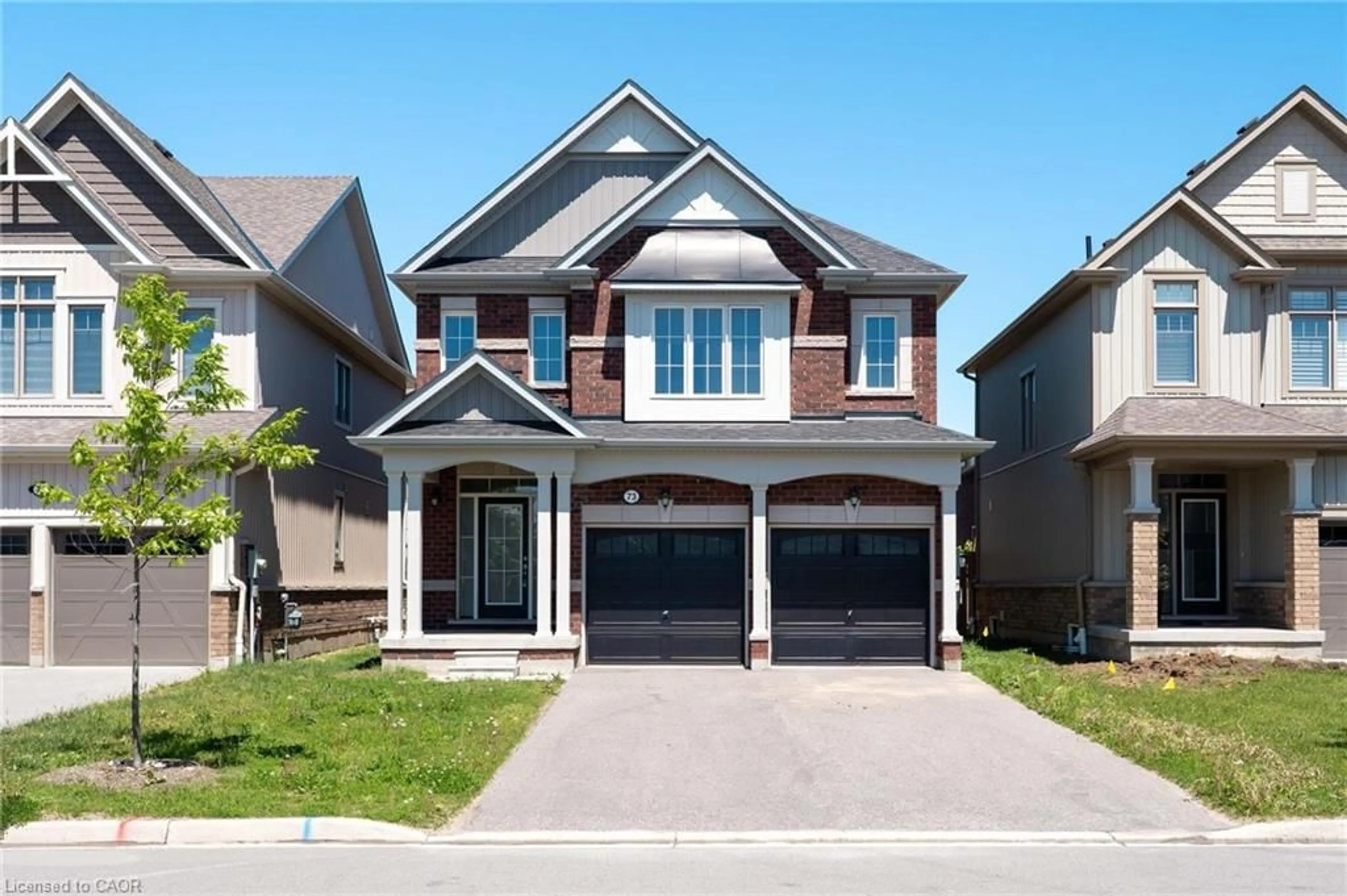 Home with brick exterior material, street for 73 Tracey Lane, Collingwood Ontario L9Y 3V2