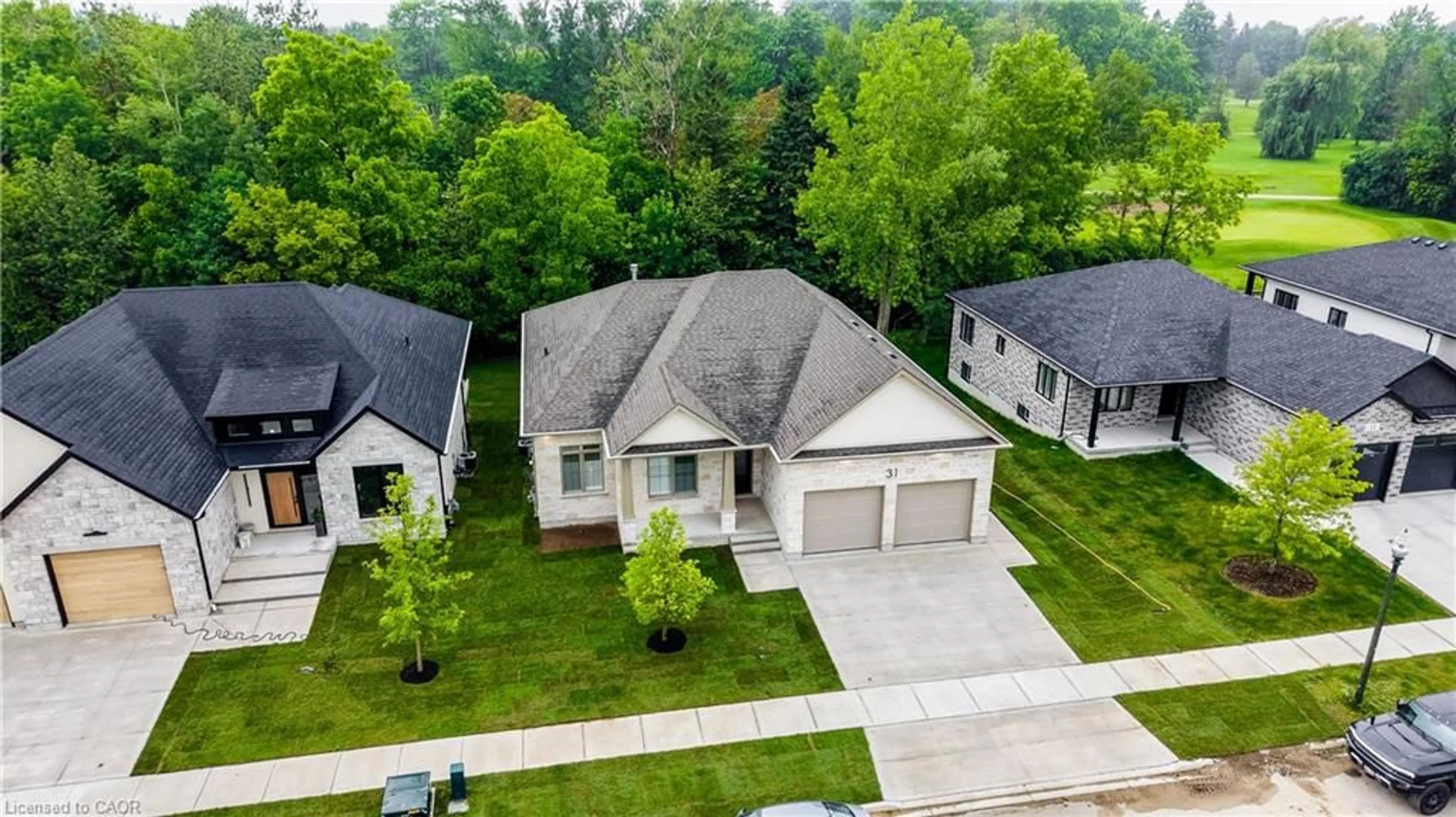 A pic from outside/outdoor area/front of a property/back of a property/a pic from drone, street for 31 Gilmer Cres, Listowel Ontario N4W 0H3