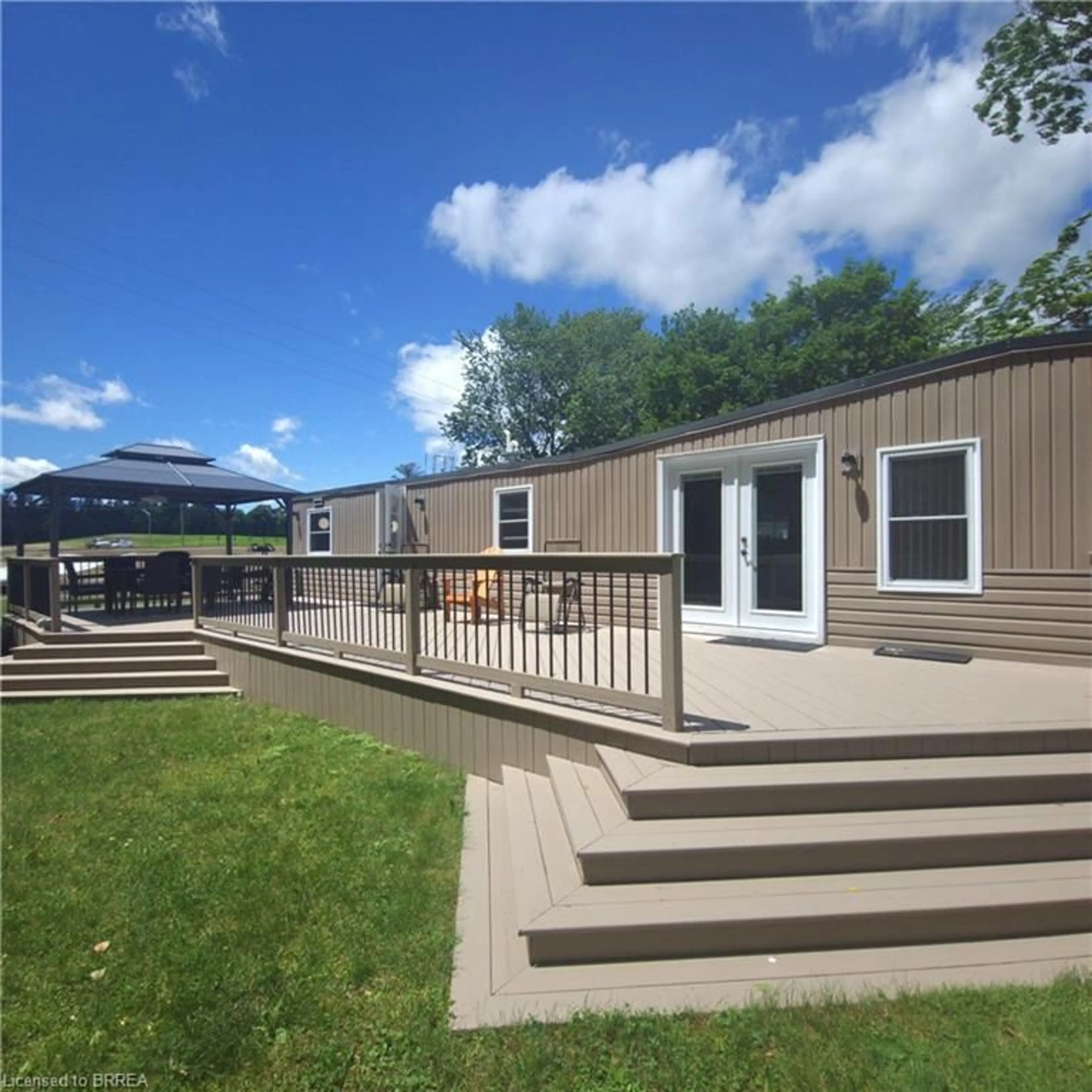 A pic from outside/outdoor area/front of a property/back of a property/a pic from drone, unknown for 580 Beaver Creek Rd #Lot 158, Waterloo Ontario N2J 3Z4