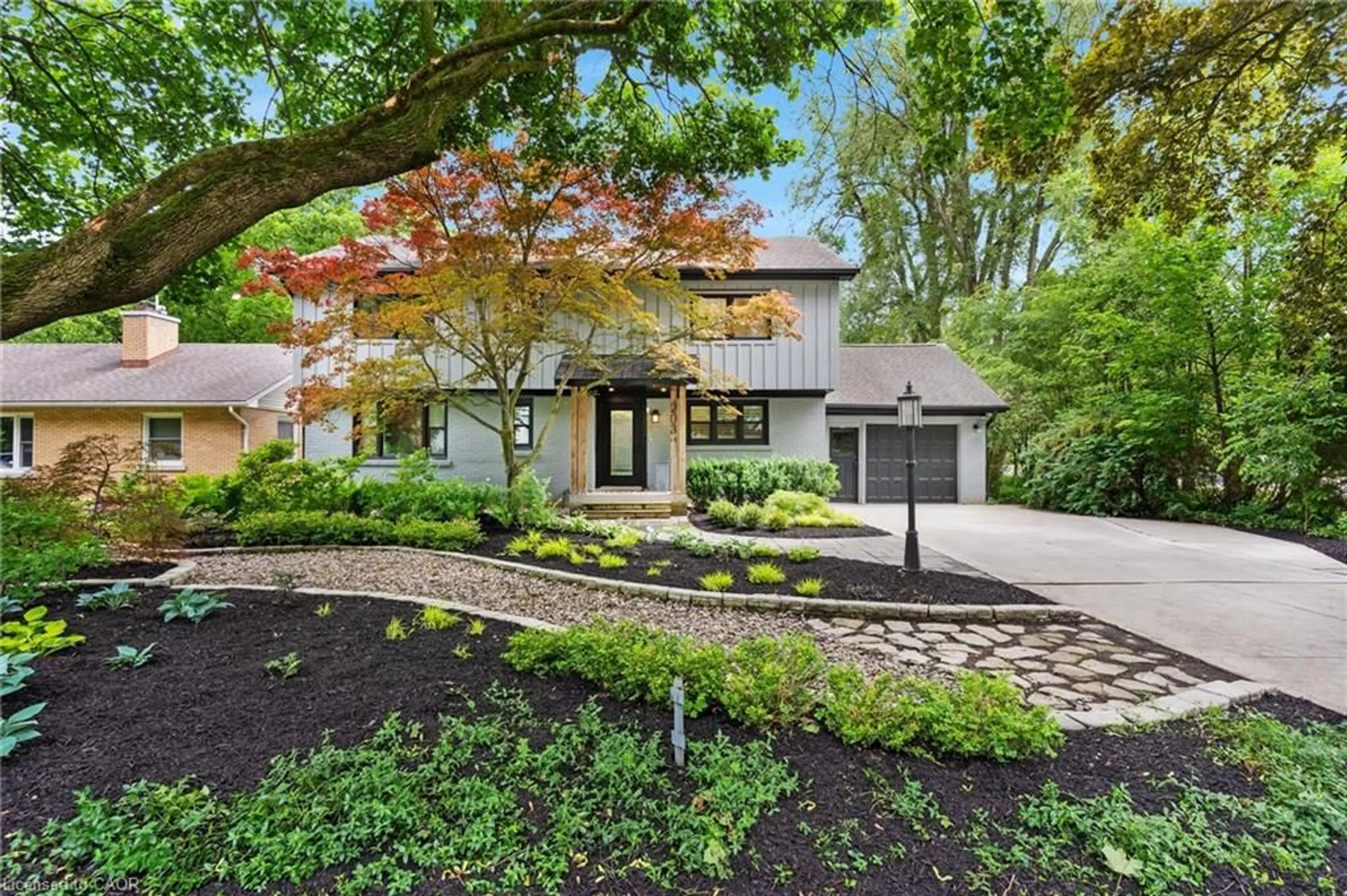 Home with brick exterior material, street for 203 Forsyth Dr, Waterloo Ontario N2L 1A1