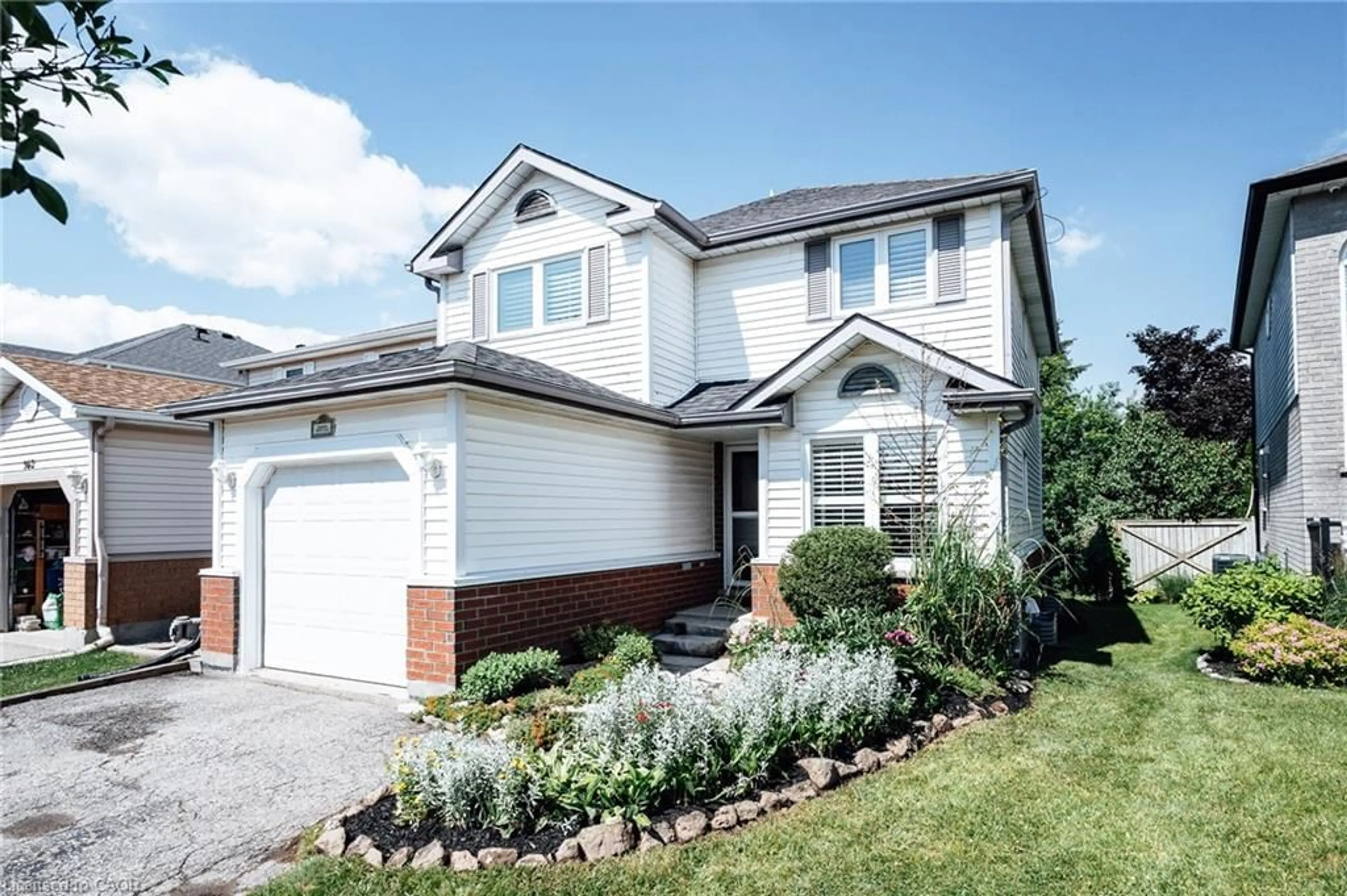 Home with vinyl exterior material, street for 560 Penny Lane, Waterloo Ontario N2T 2L3