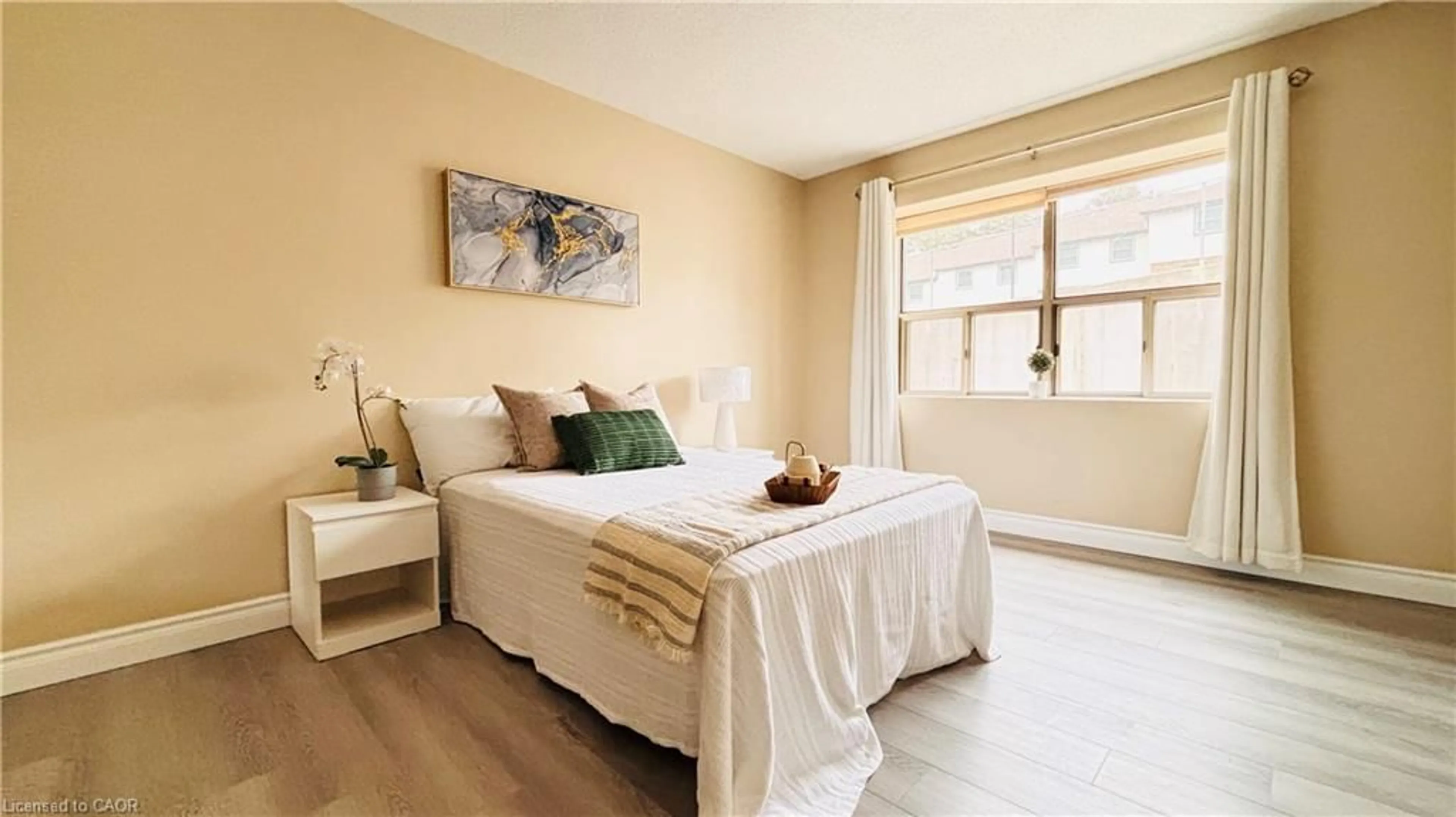 Bedroom with bed, wood/laminate floor for 300 Keats Way #207, Waterloo Ontario N2L 6E6