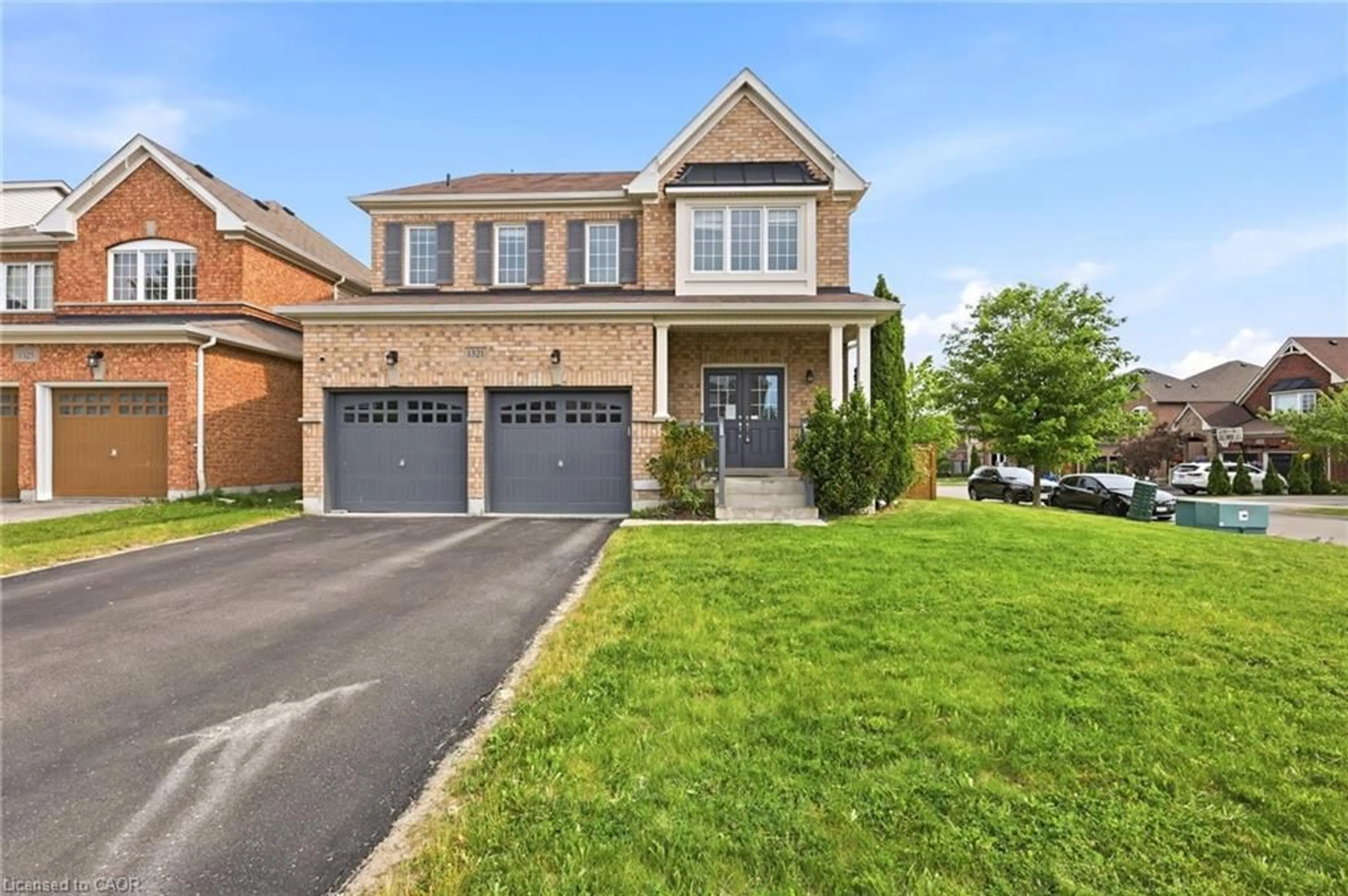 Home with brick exterior material, street for 1321 Kenmark Ave, Oshawa Ontario L1K 0N5