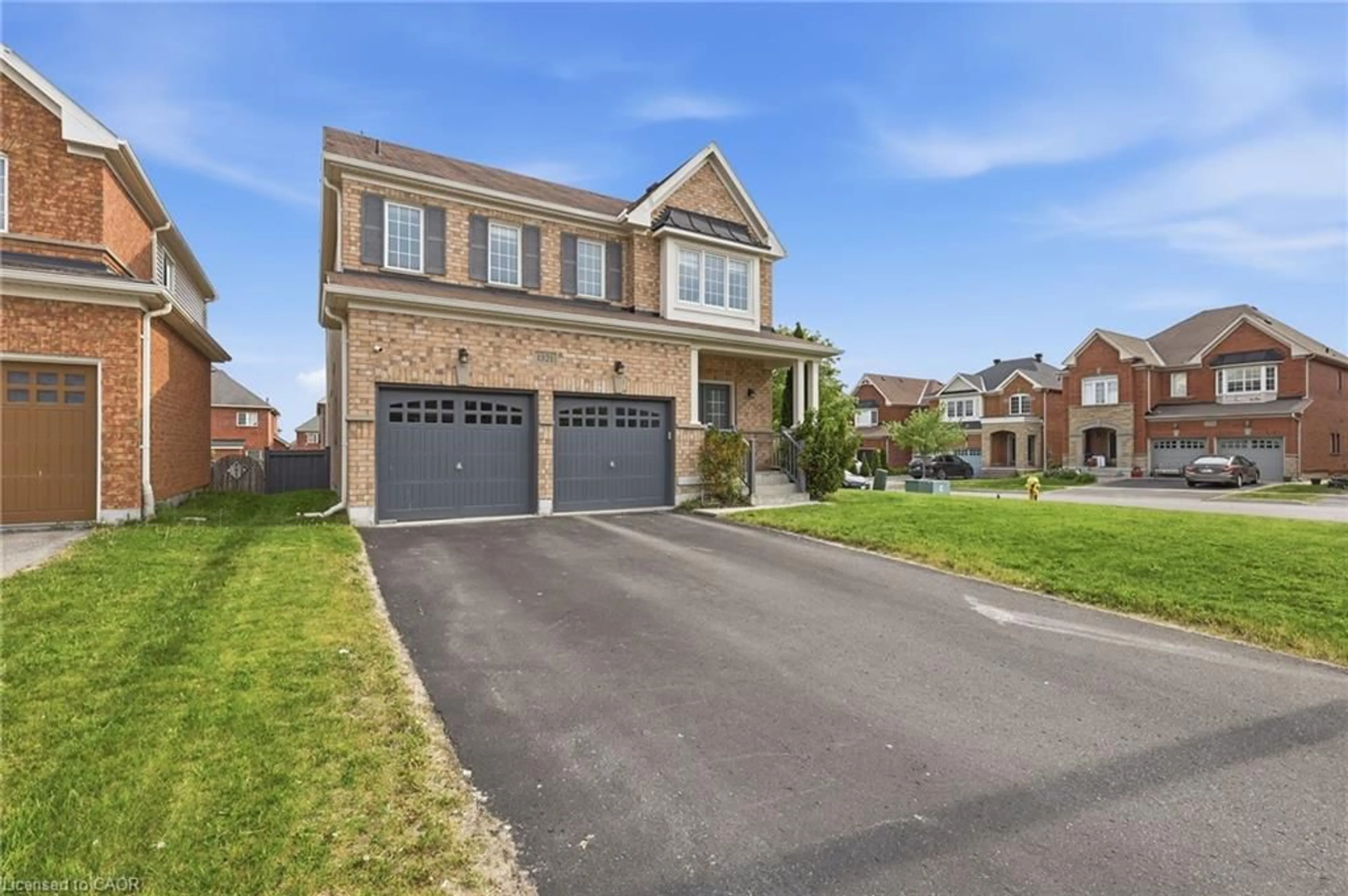 Home with brick exterior material, street for 1321 Kenmark Ave, Oshawa Ontario L1K 0N5
