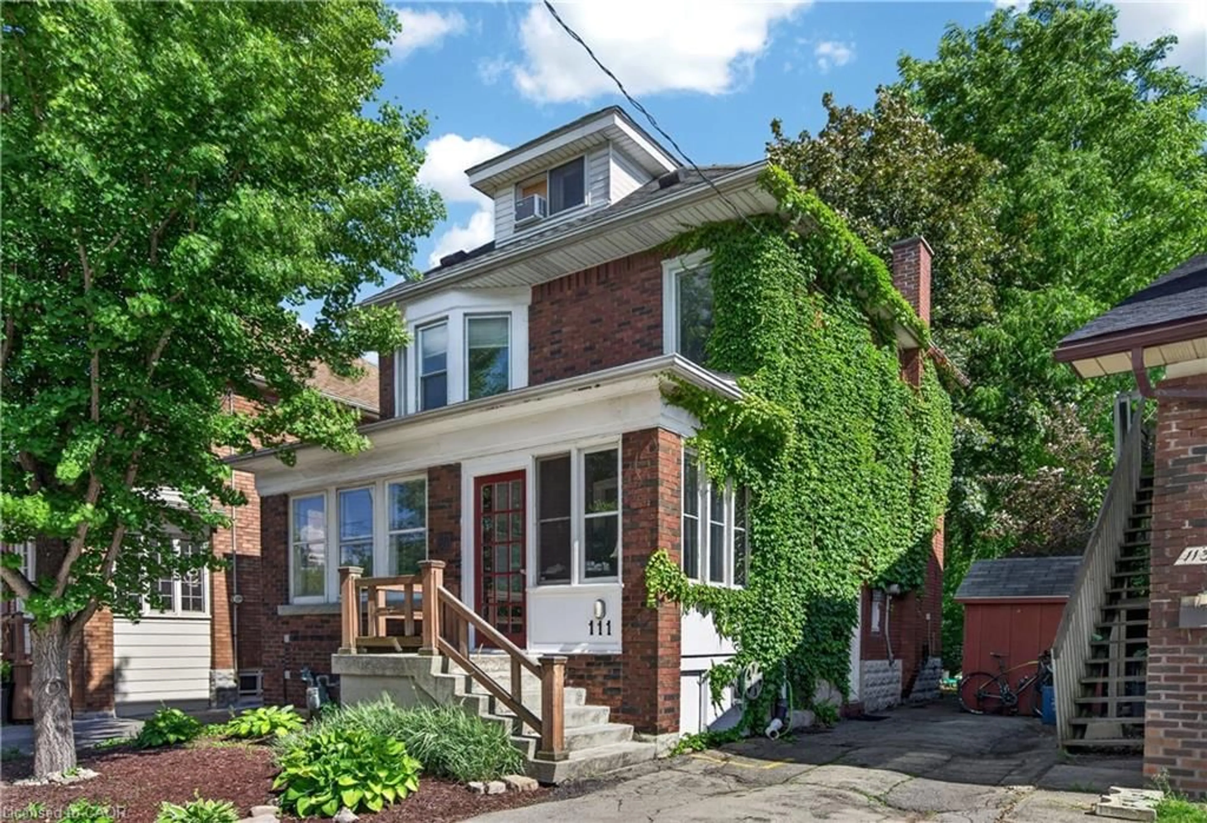 Home with brick exterior material, street for 111 South Oval, Hamilton Ontario L8S 1R2