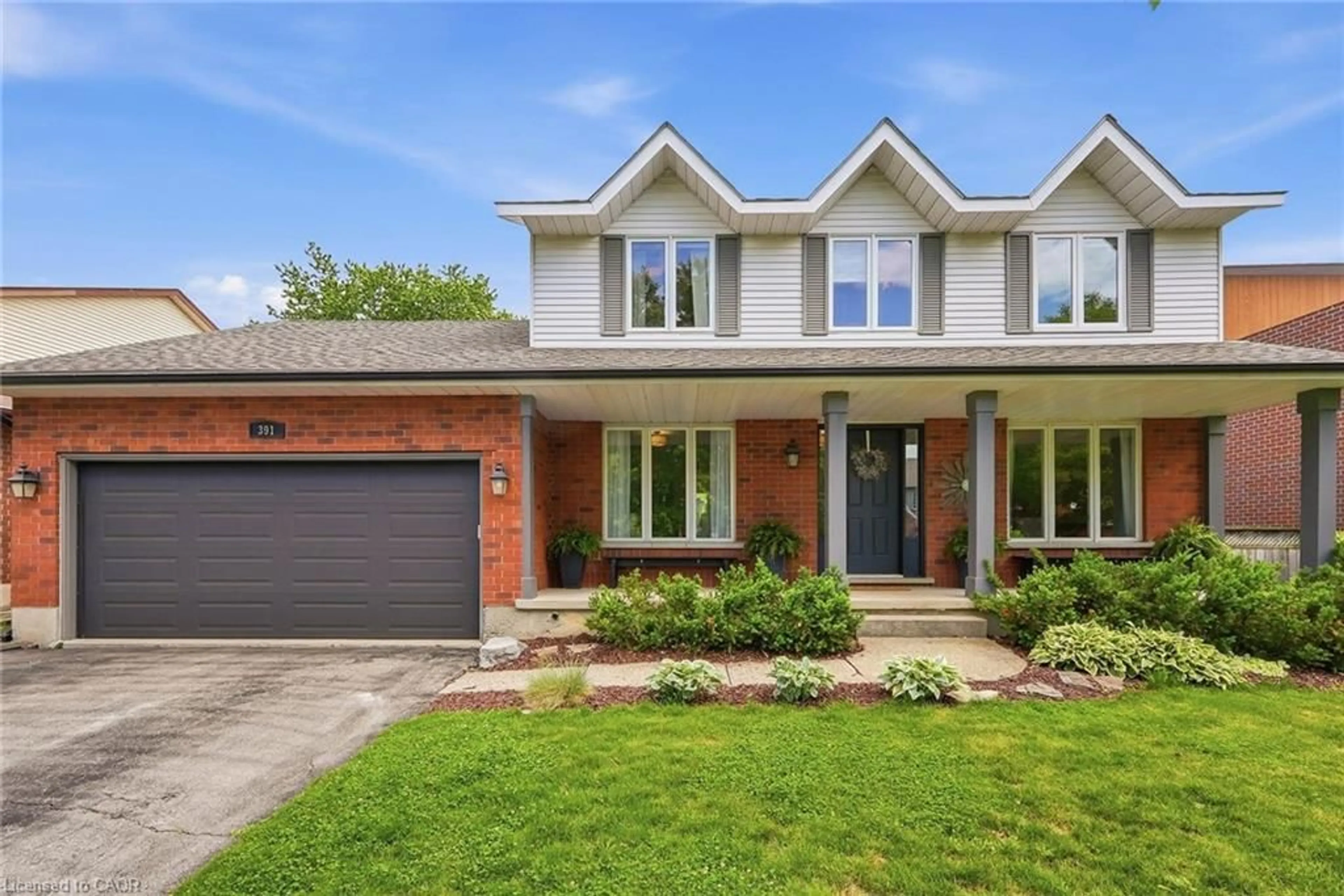 Home with brick exterior material, street for 391 Timlock Pl, Waterloo Ontario N2K 3J1