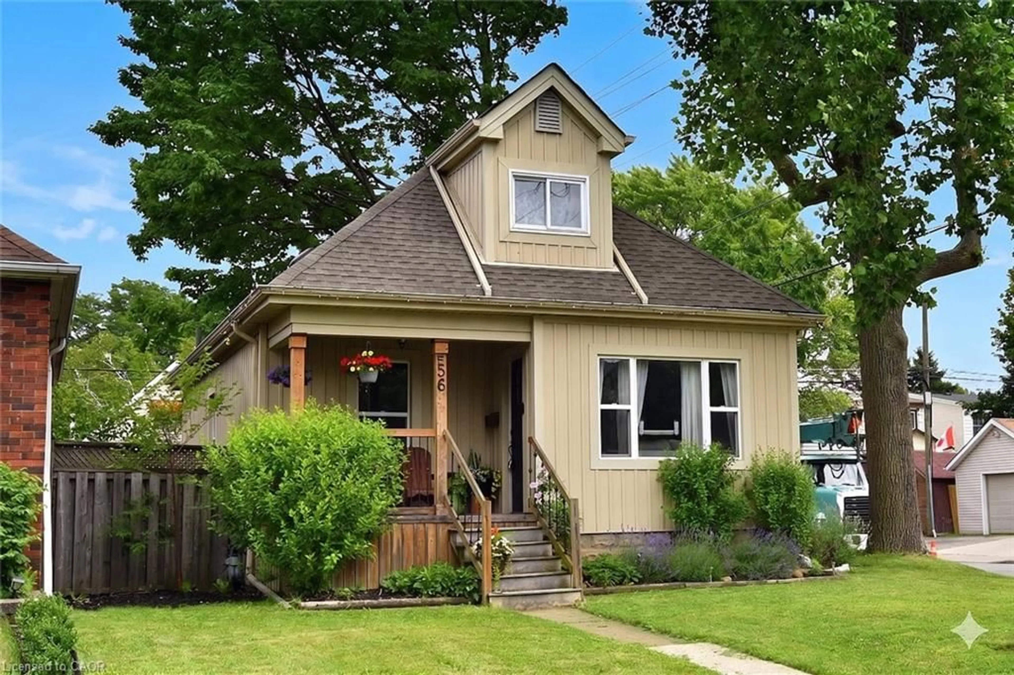 Home with vinyl exterior material, street for 56 Barons Ave, Hamilton Ontario L8H 5A4