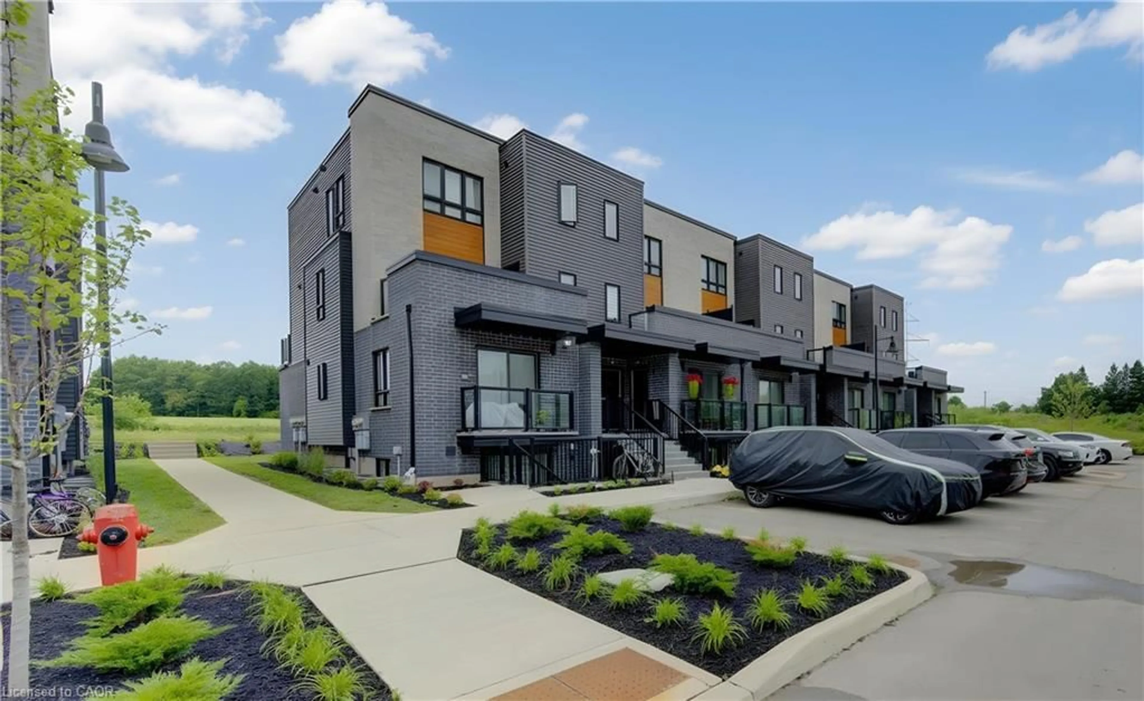Home with brick exterior material, street for 235 Chapel Hill Dr #14, Kitchener Ontario N2R 0S4