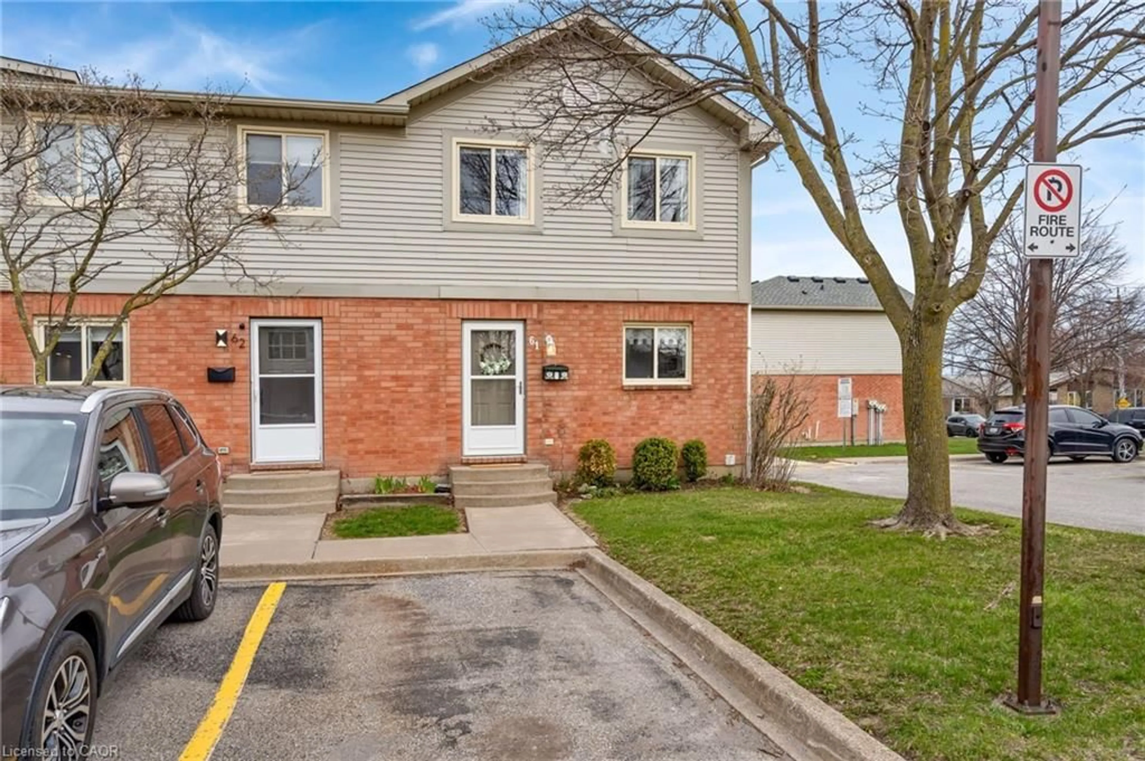 Home with brick exterior material, street for 65 Dorchester Blvd #61, St. Catharines Ontario L2M 7T1