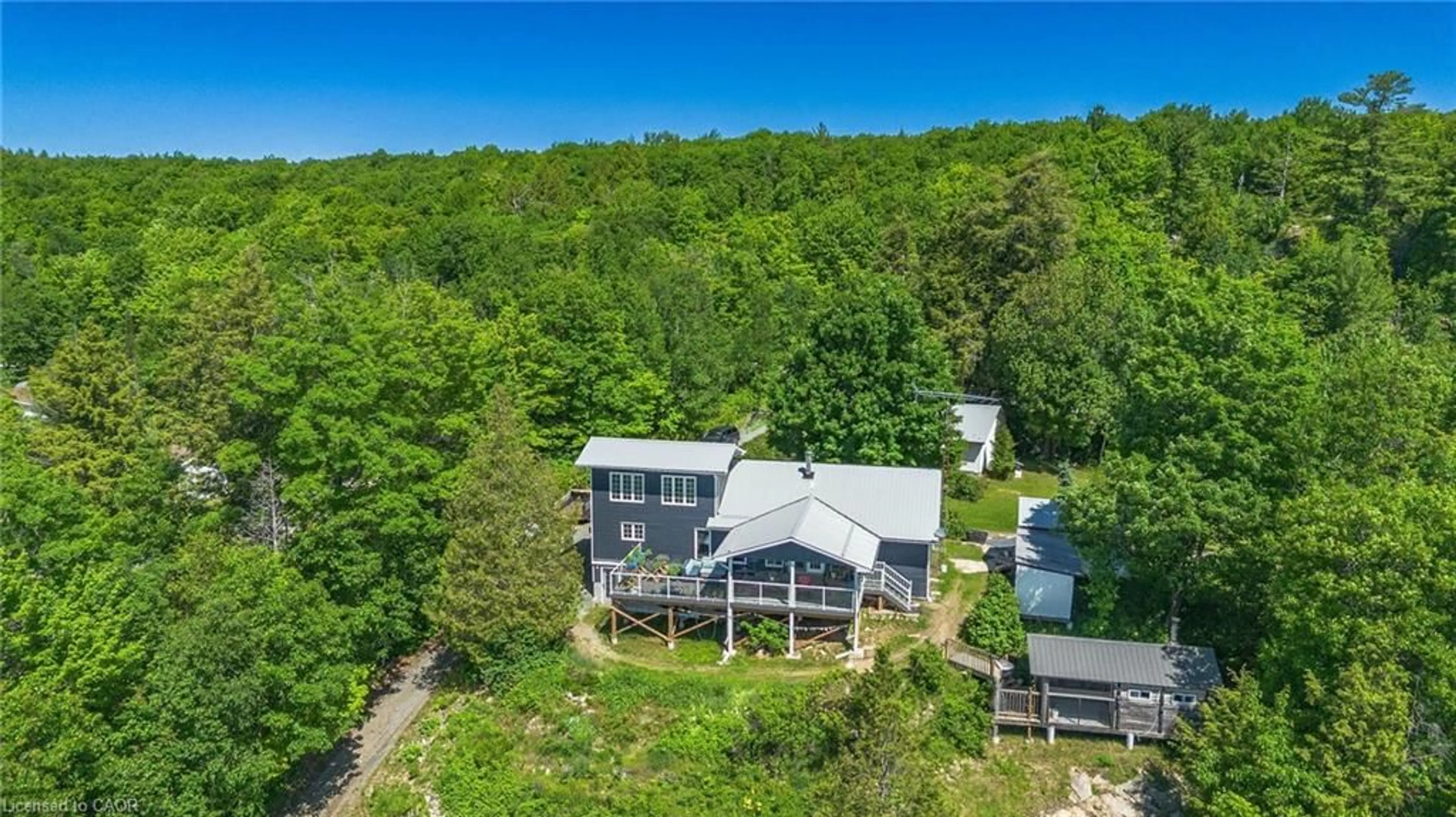 A pic from outside/outdoor area/front of a property/back of a property/a pic from drone, water/lake/river/ocean view for 16 Sunset Bay Dr, Walford Ontario P0P 2A0