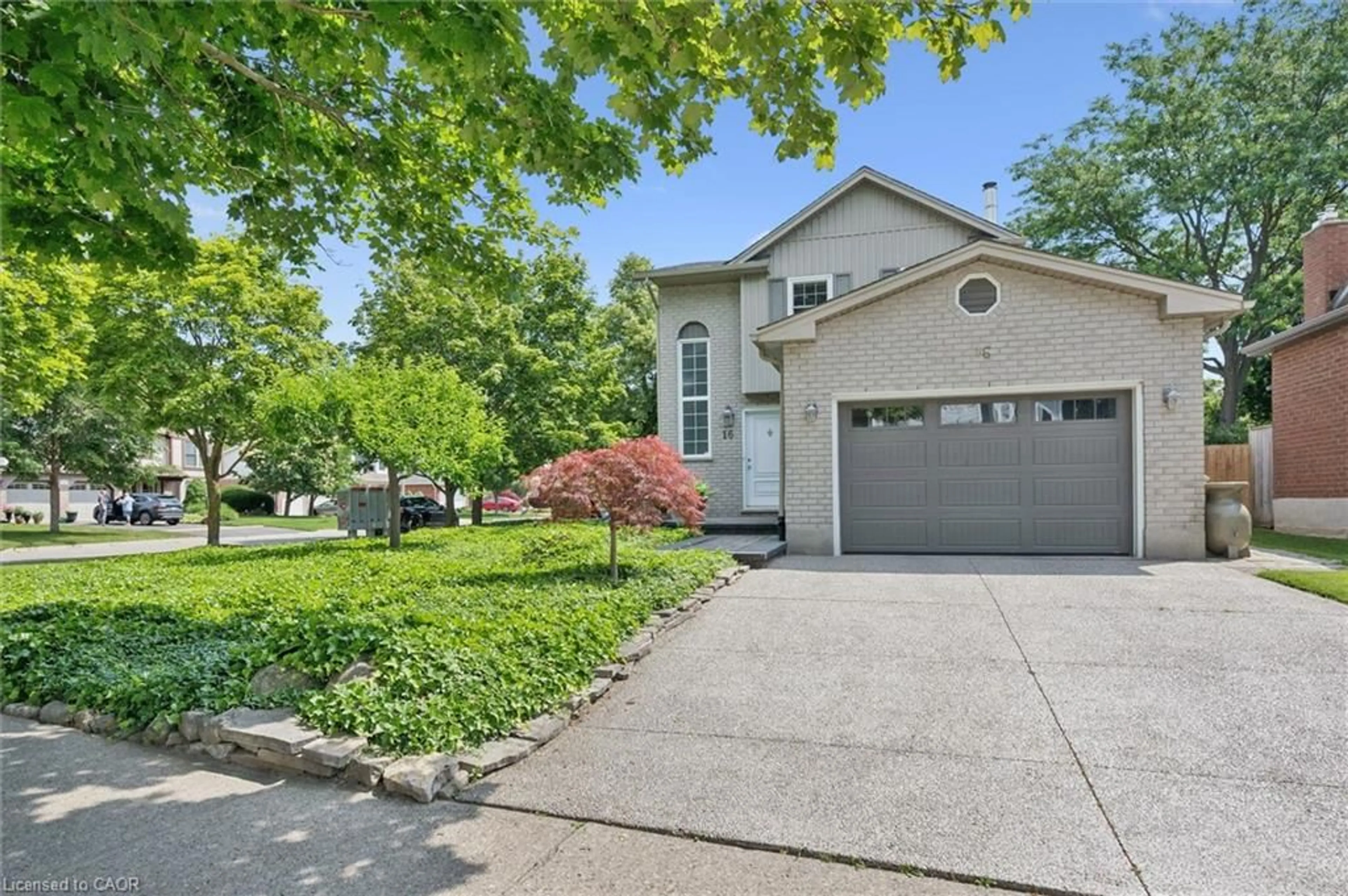Home with vinyl exterior material, street for 16 Manitoulin Cres, Kitchener Ontario N2A 3J4