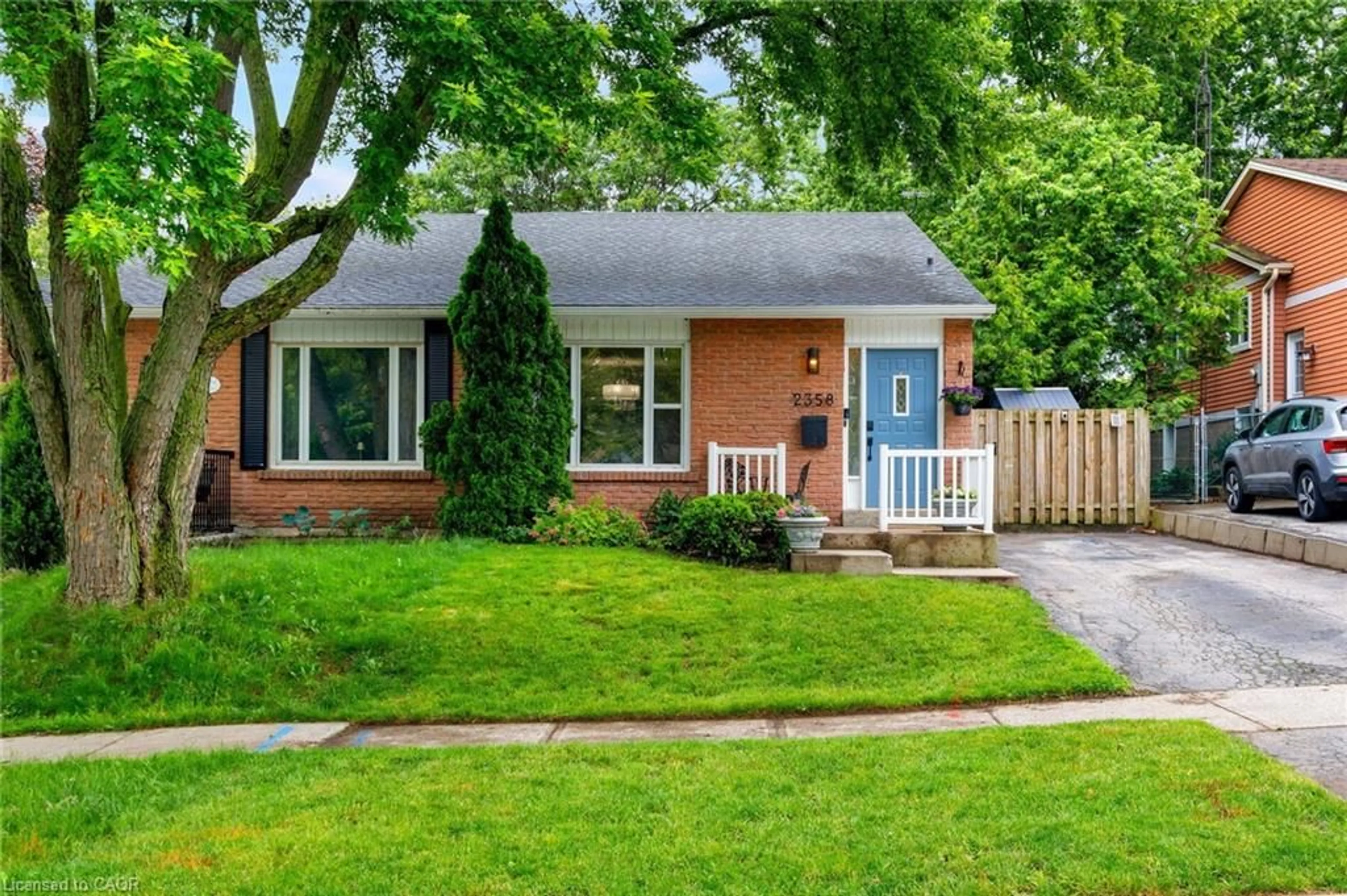 Home with brick exterior material, street for 2358 Holyhead Dr, Burlington Ontario L7P 3V3