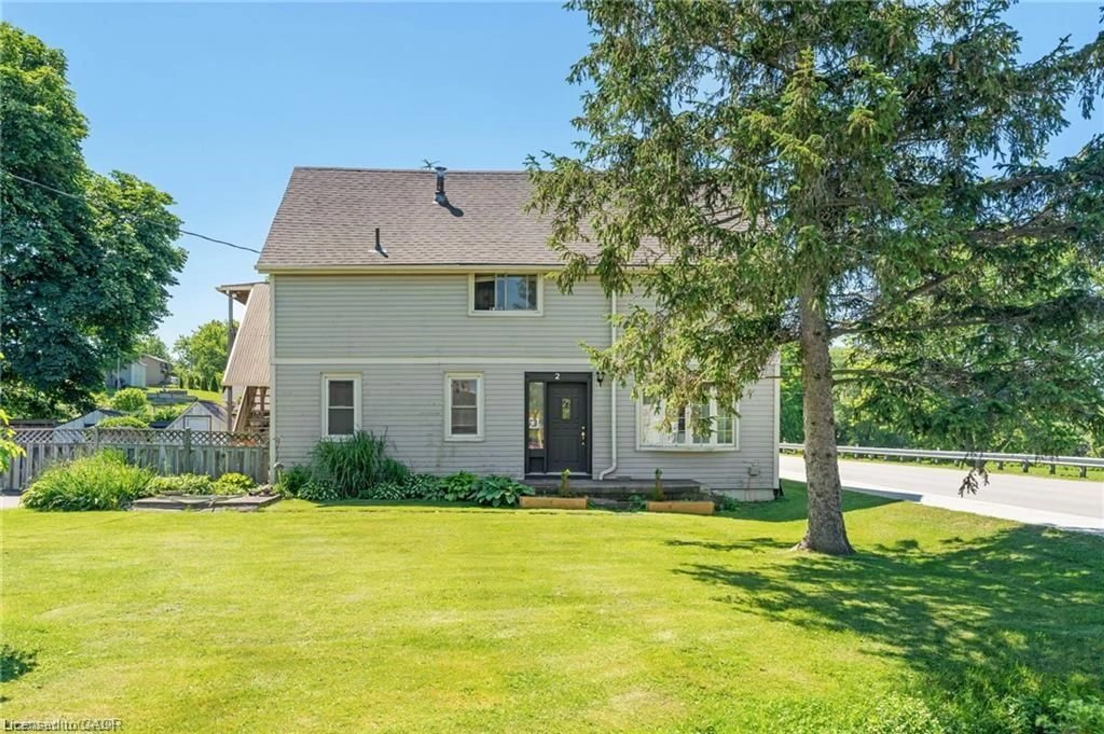 Home with vinyl exterior material, street for 2 Mill St, York Ontario N0A 1R0