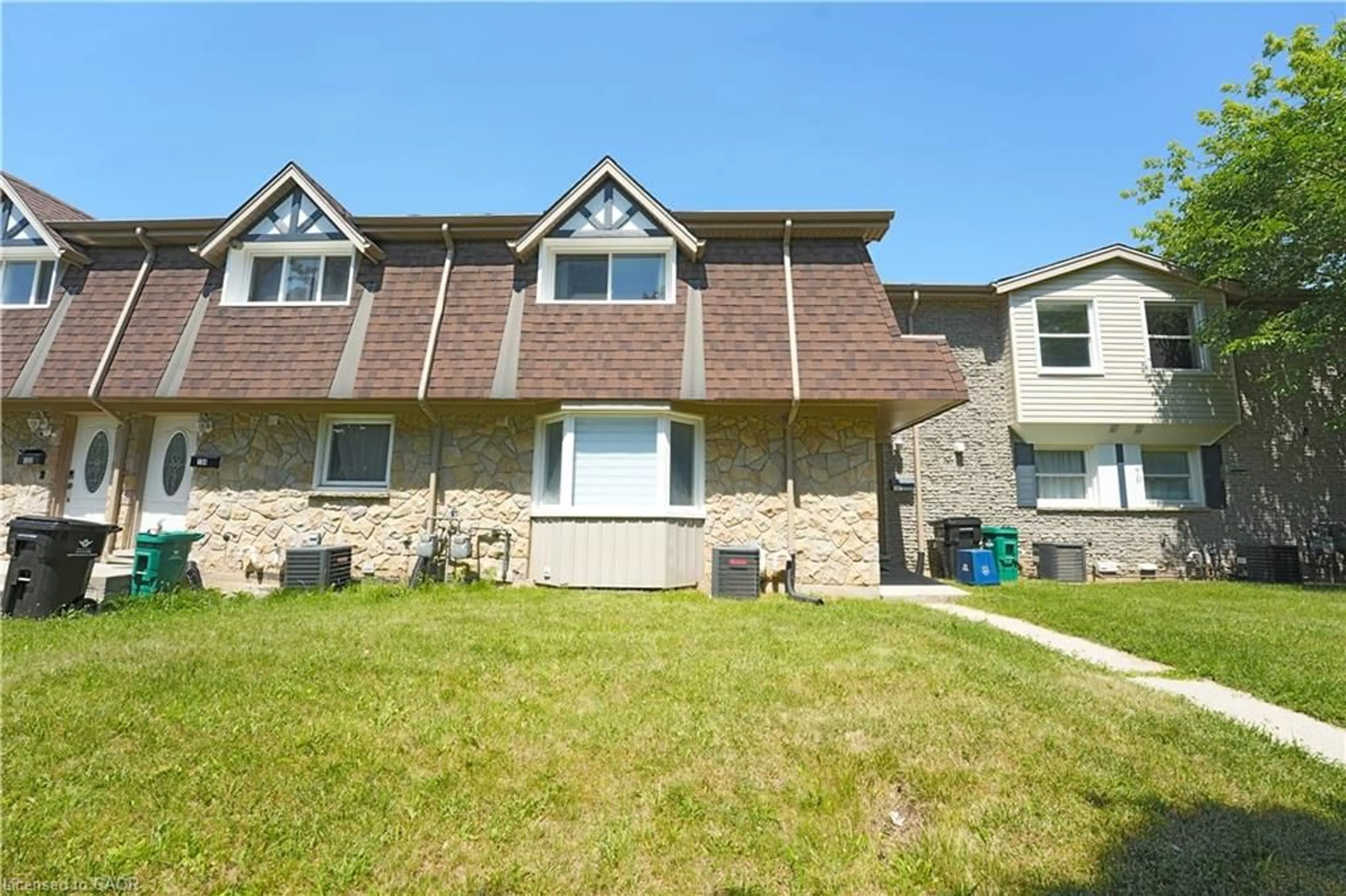 Home with vinyl exterior material, street for 136 Jansen Ave, Kitchener Ontario N2A 2L7