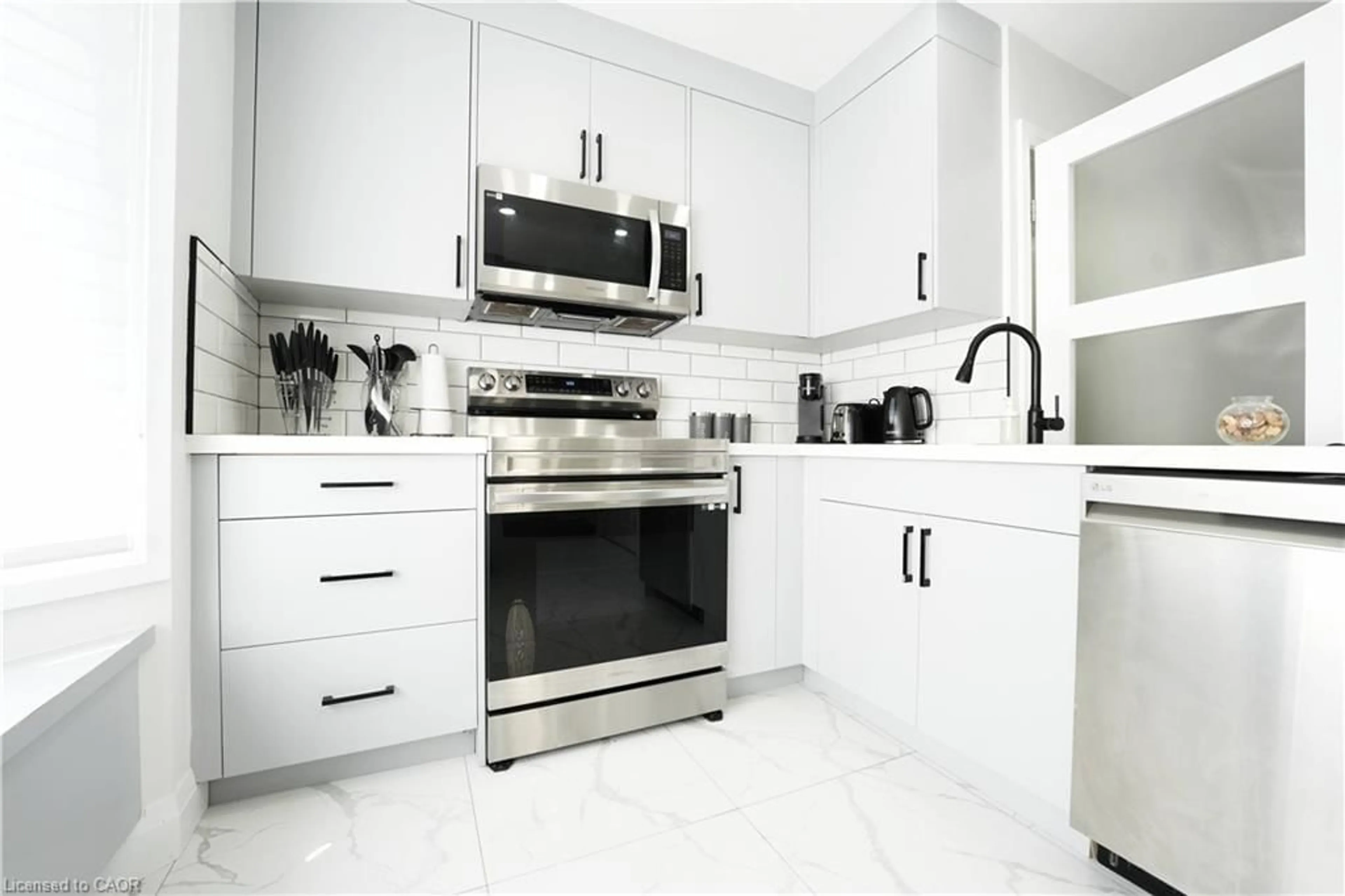 Contemporary kitchen, ceramic/tile floor for 136 Jansen Ave, Kitchener Ontario N2A 2L7