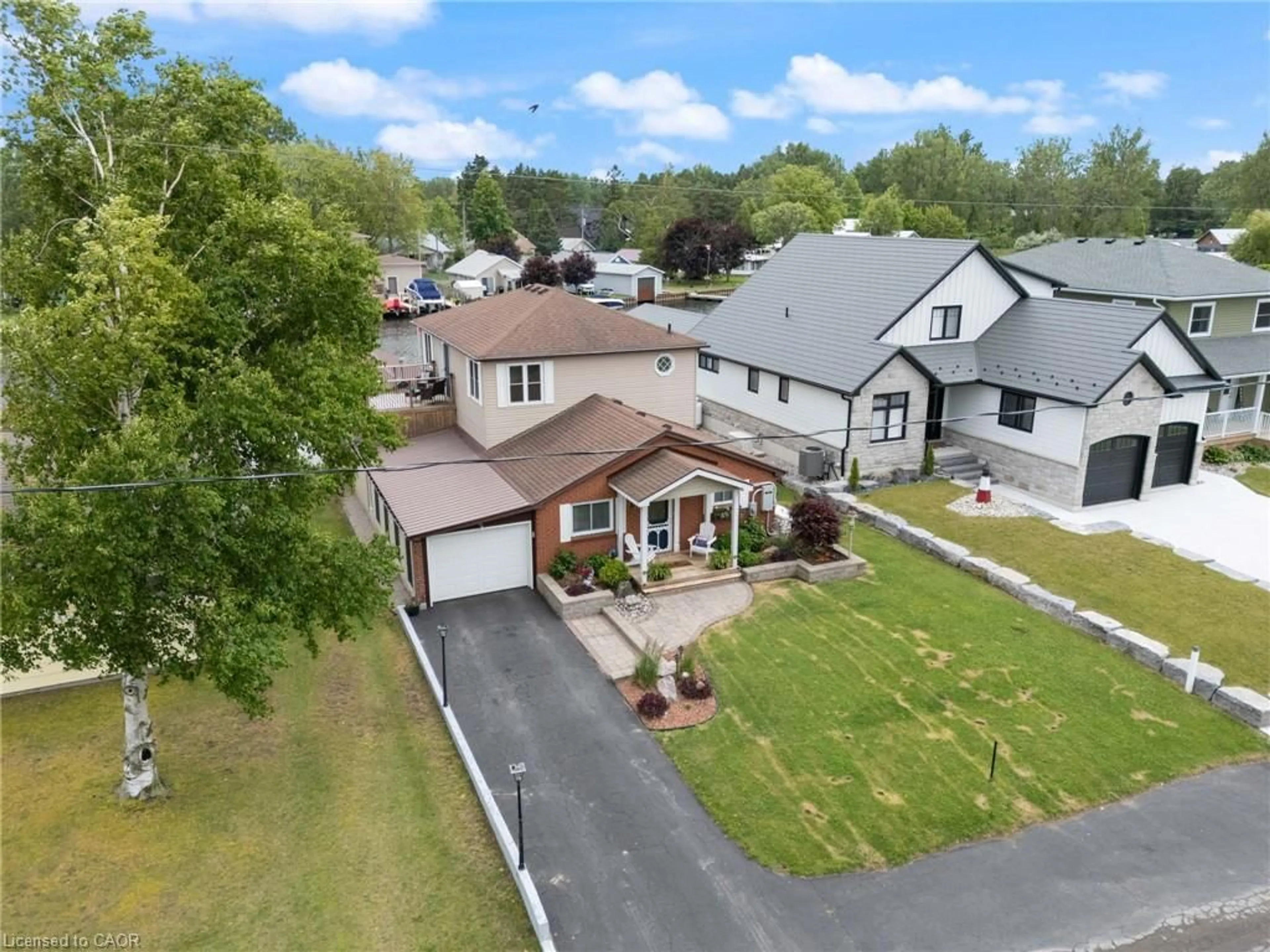 A pic from outside/outdoor area/front of a property/back of a property/a pic from drone, street for 13 Rogers Ave, Long Point Ontario N0E 1M0