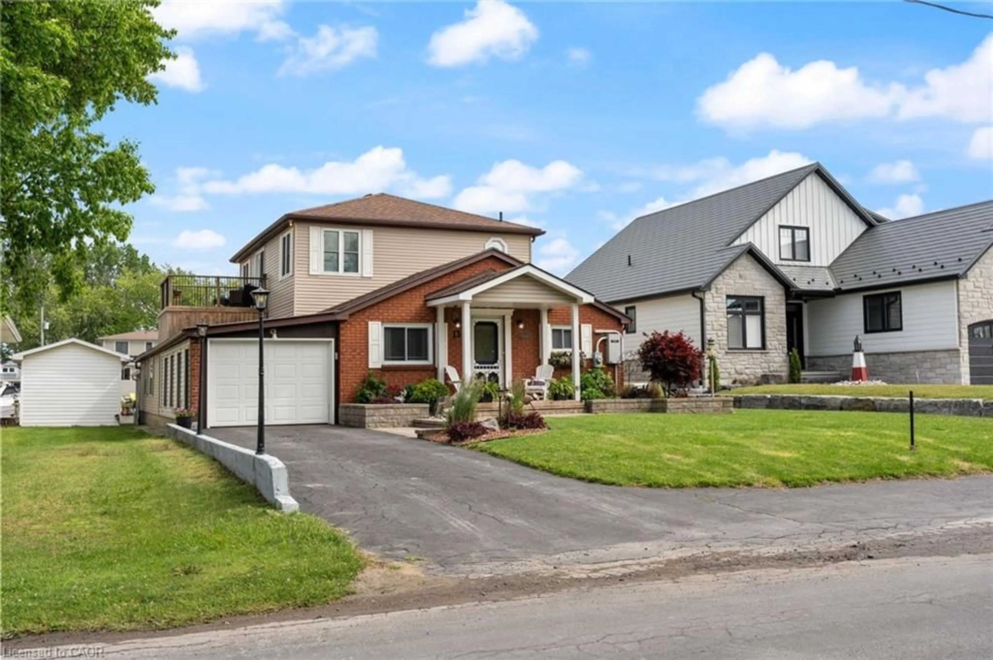Home with vinyl exterior material, street for 13 Rogers Ave, Long Point Ontario N0E 1M0