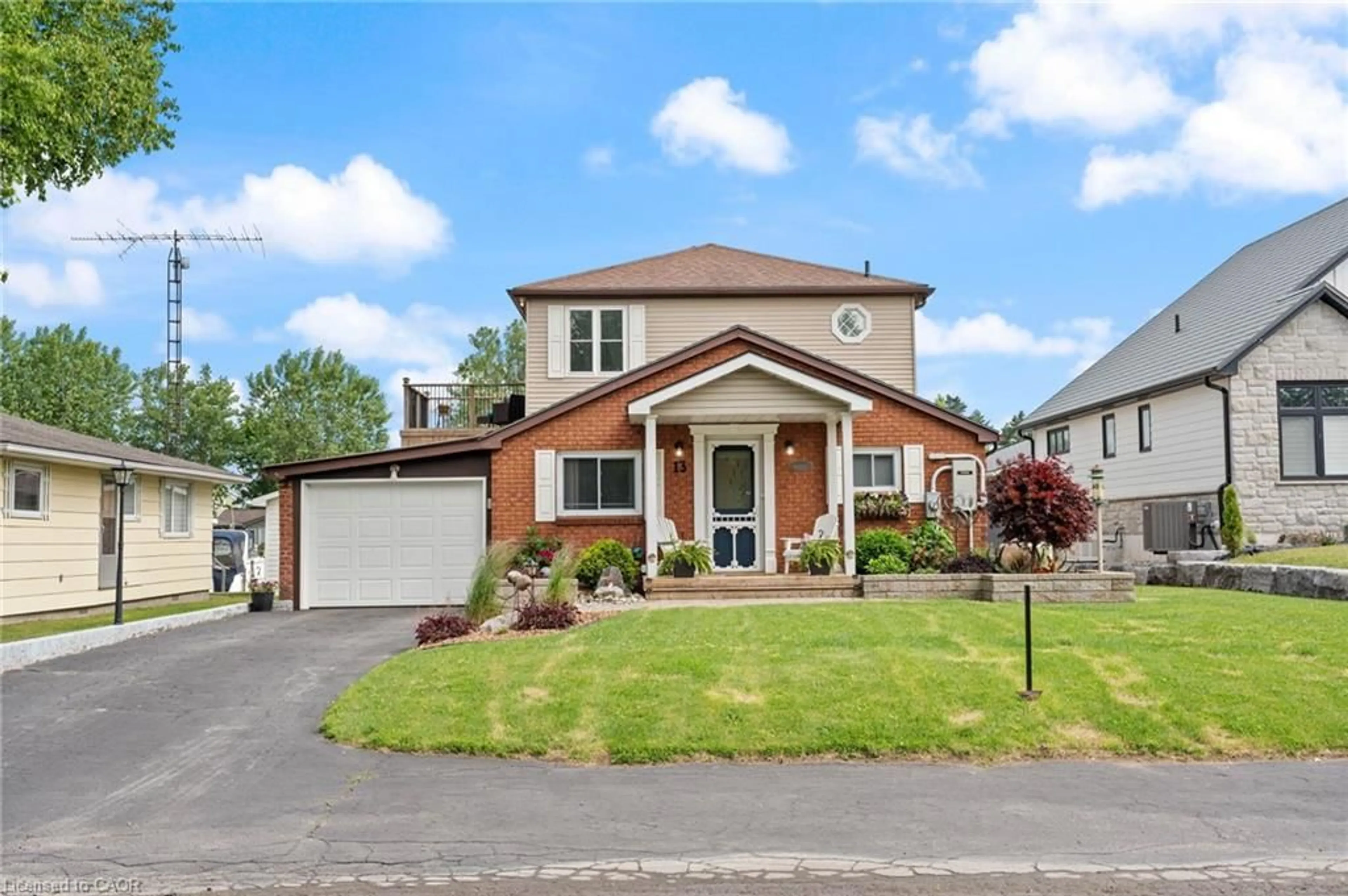 Home with brick exterior material, street for 13 Rogers Ave, Long Point Ontario N0E 1M0
